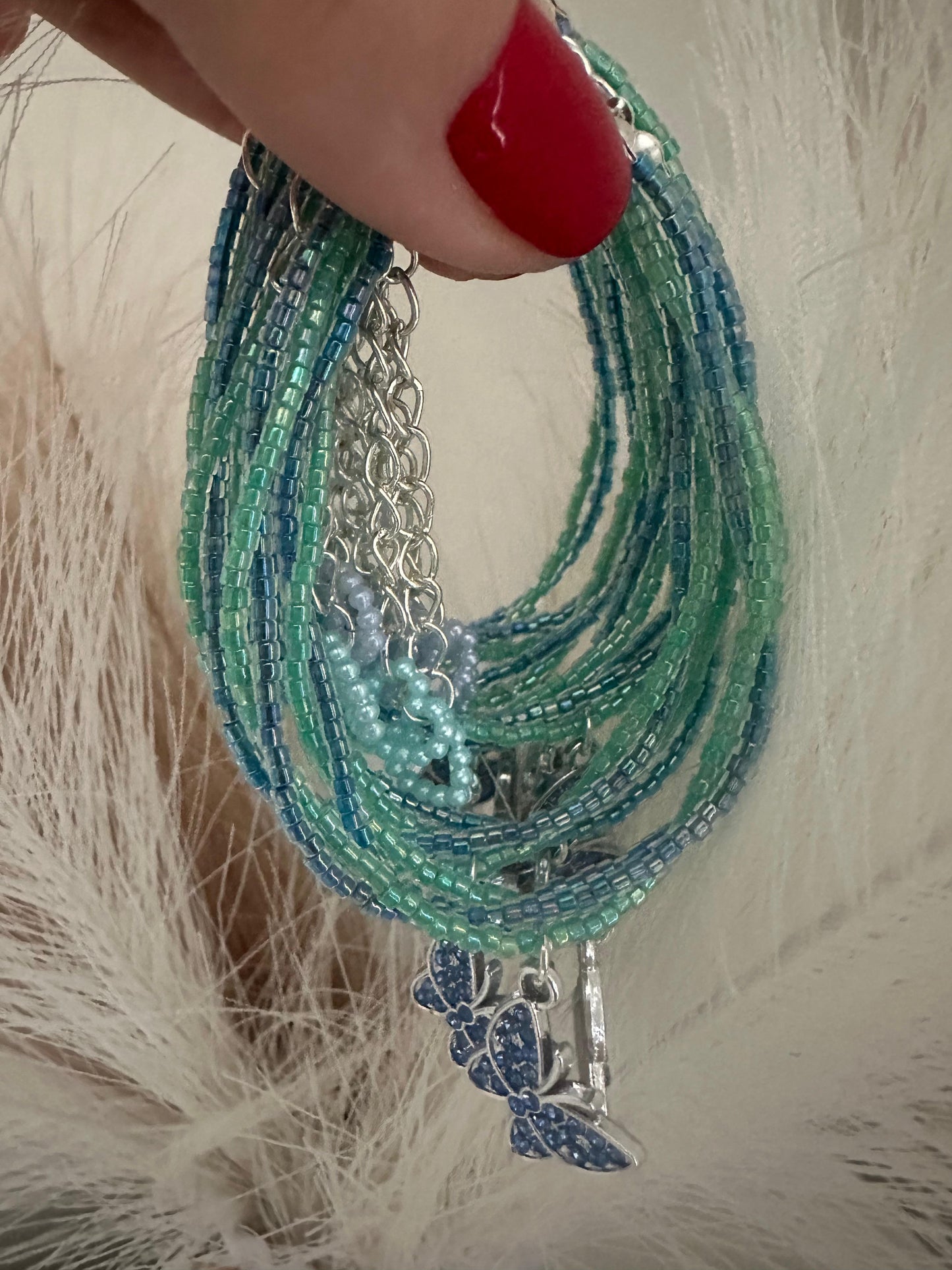 Handmade AZURE GLOW BUTTERFLY bracelet with green and blue Miyuki beads and silver butterfly charm