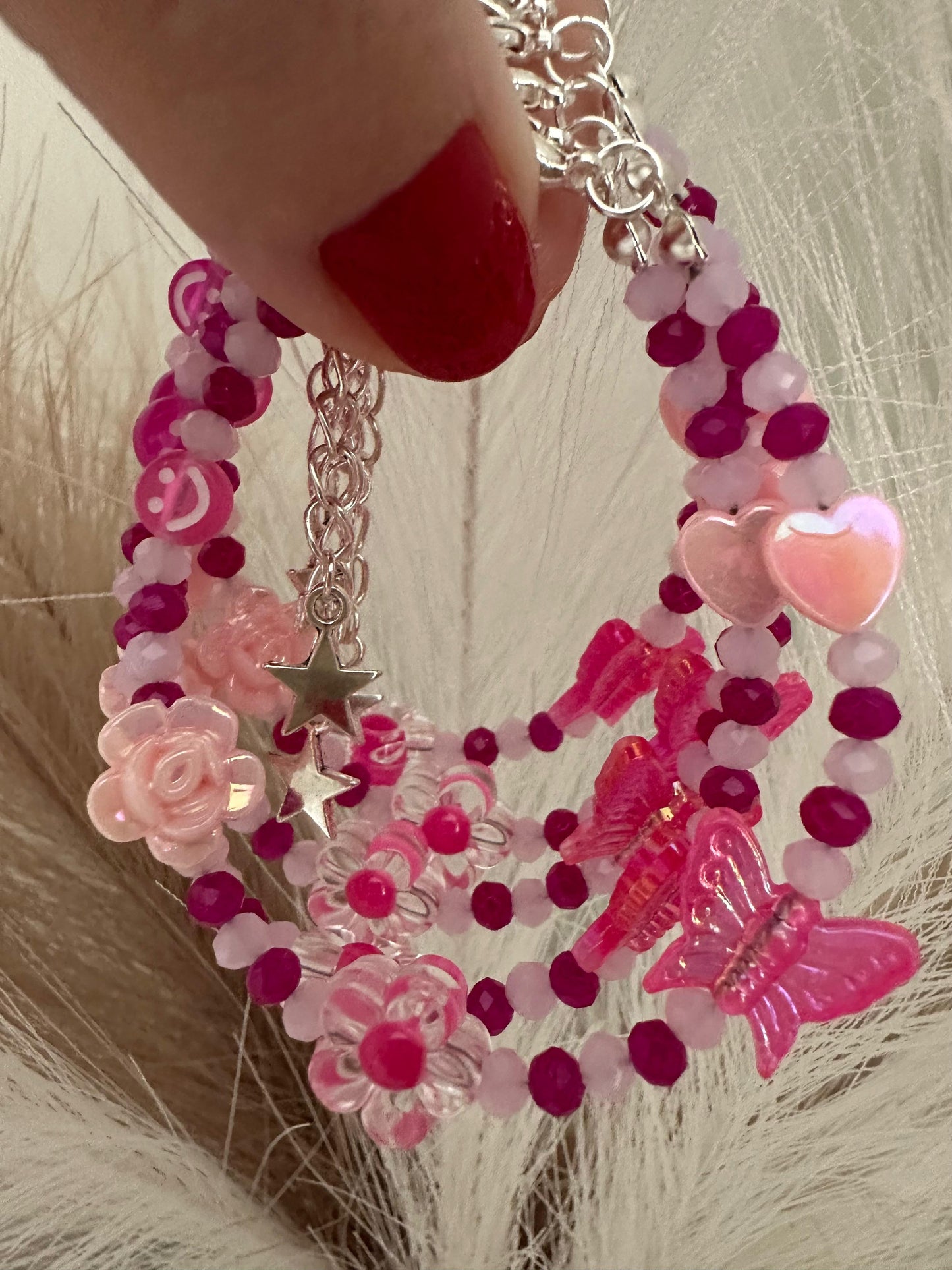 BLUSH RADIANCE handmade bracelet with pink and fuchsia glass and acrylic beads on nylon string with stainless steel clasp