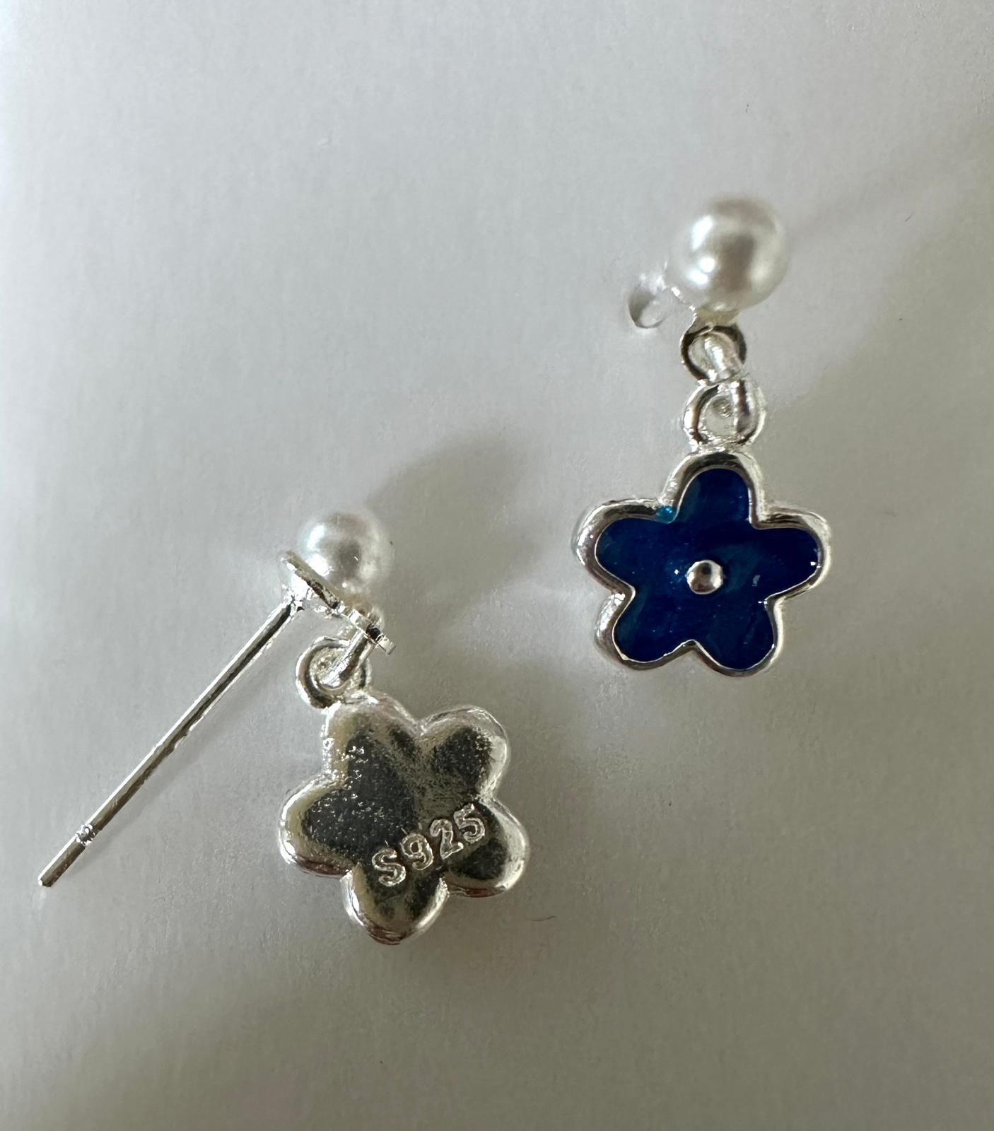 Blue Dream Petal stainless steel stud earrings with deep blue enamel petals and silver finish