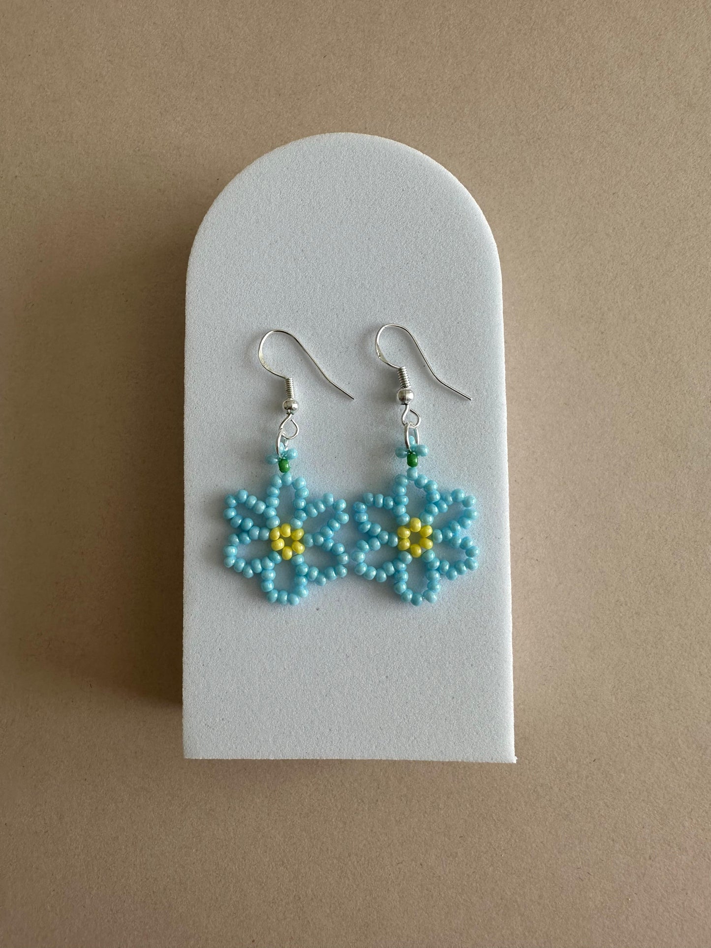 Handmade DAISY BLOOM silver earrings with white and sky blue floral beads on sterling silver hooks