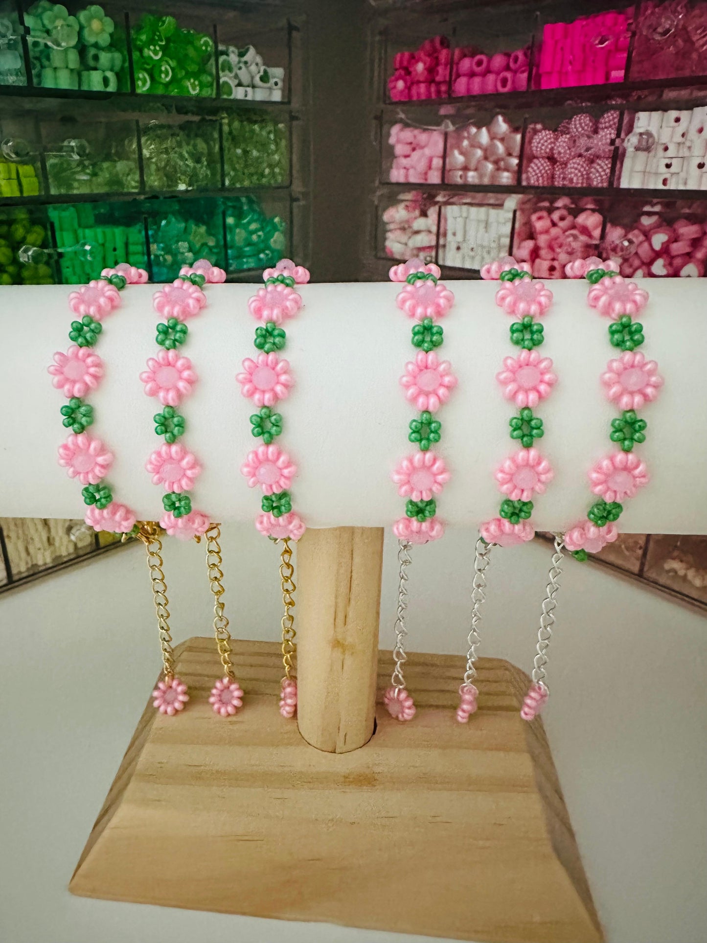 Handmade pink garden delight bracelet with gold and silver options, featuring glass beads and stainless steel chain