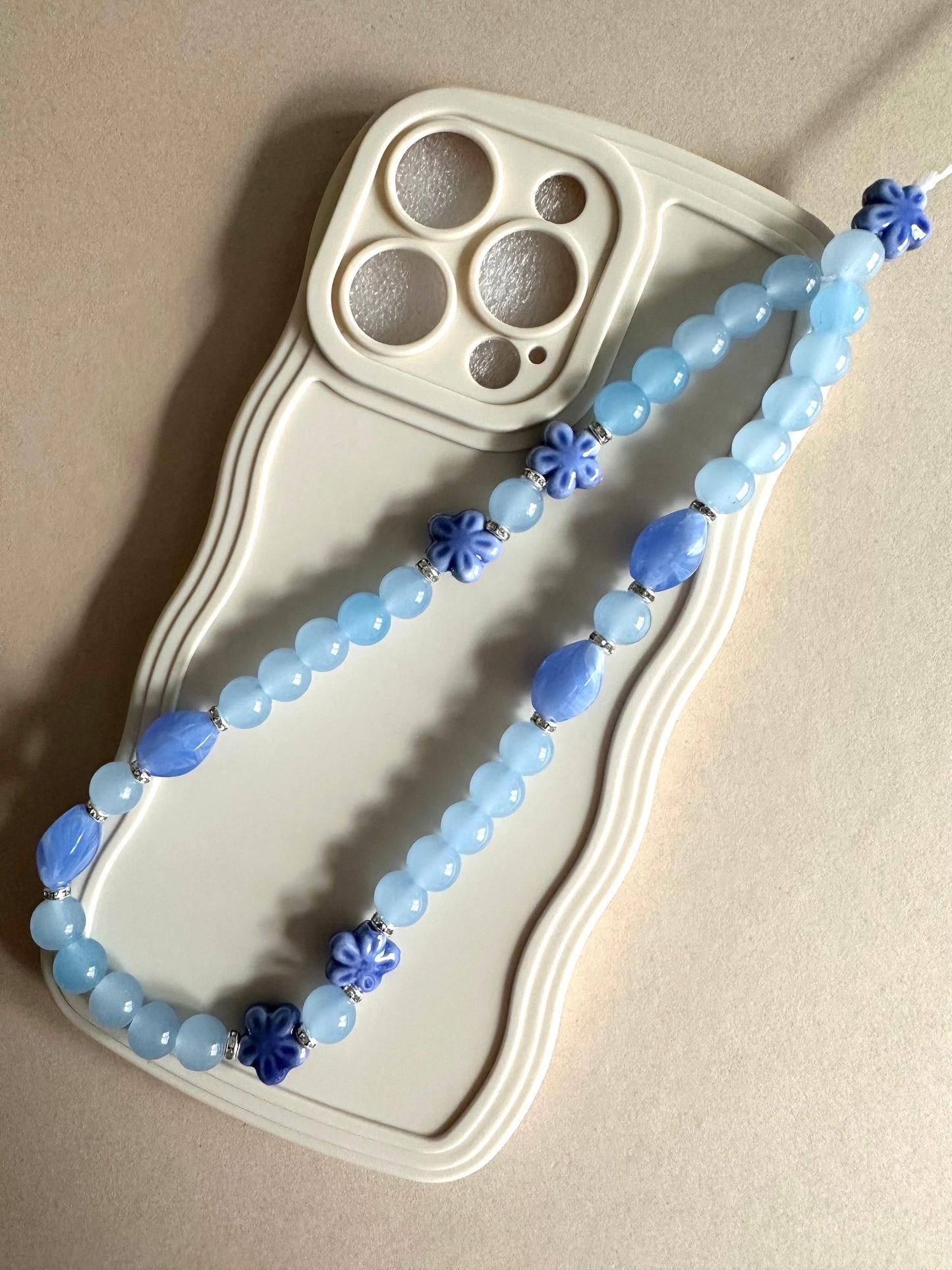 Handmade BLUE DREAM phone charm with blue and silver beads, versatile accessory for phones, AirPods, keys, and bags
