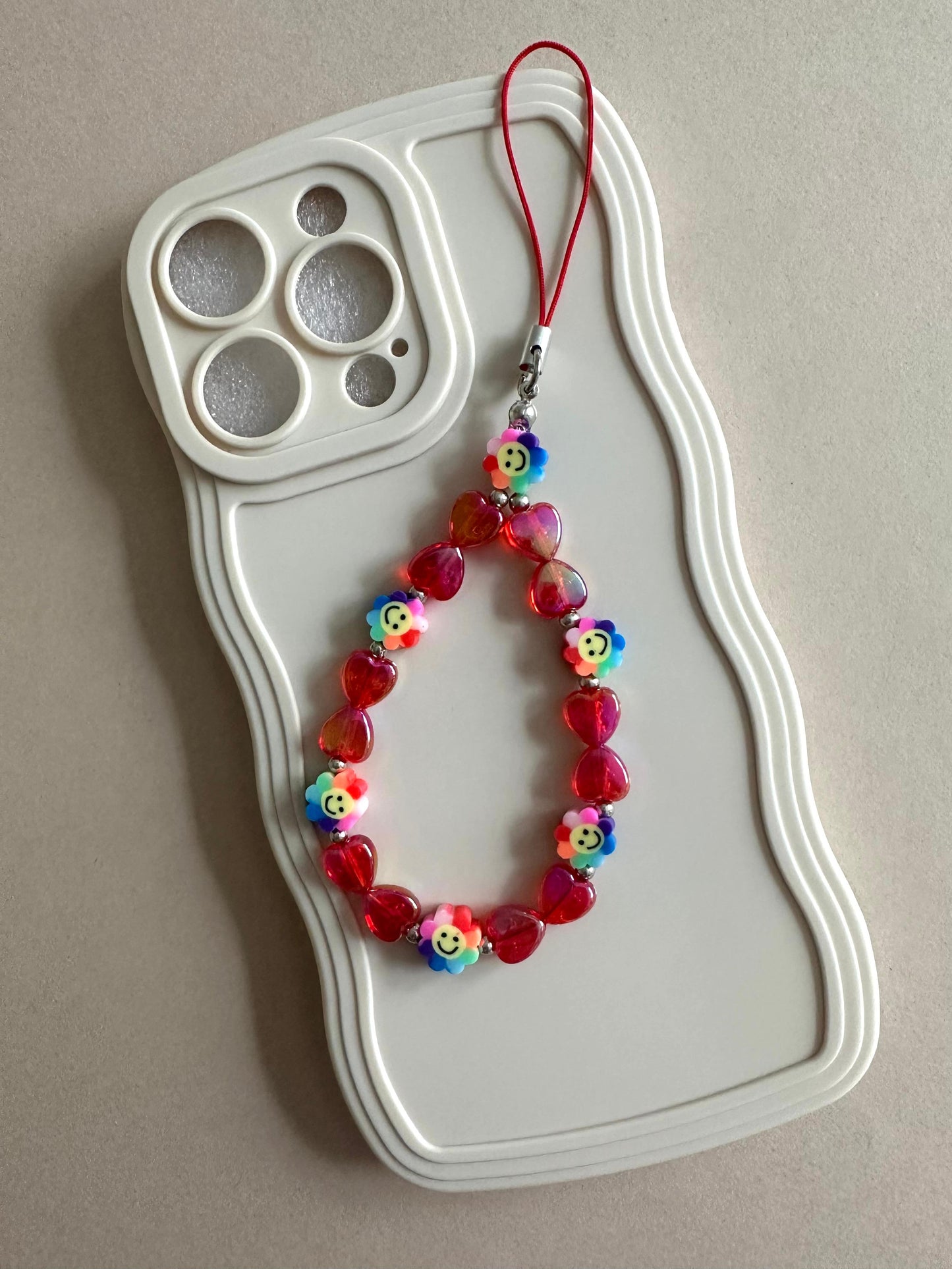 Handmade CHEERFUL LOVE phone charm with colorful beads and versatile design for phones and accessories