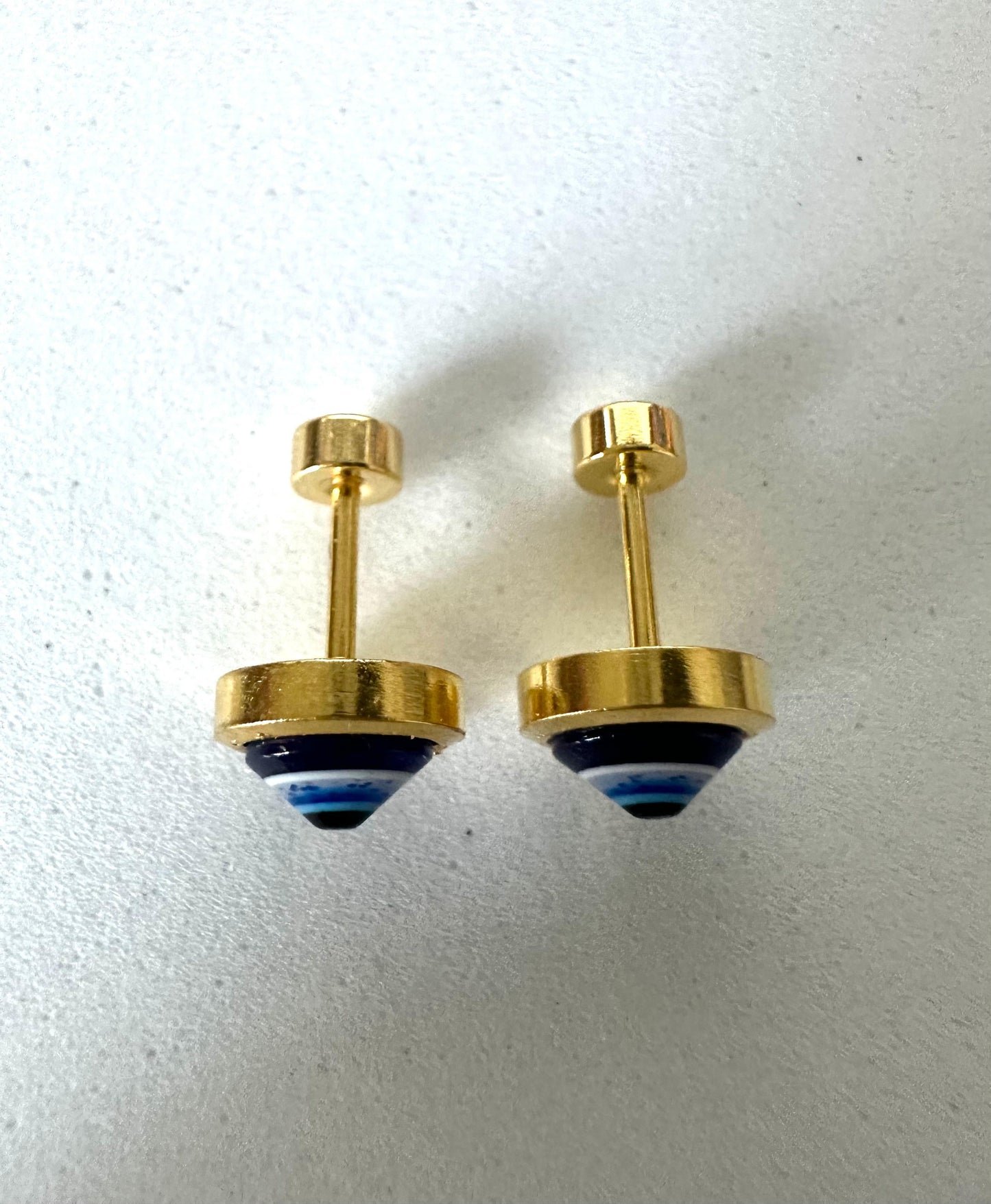 Evil eye stainless steel stud earrings with 18K gold plating and blue accent