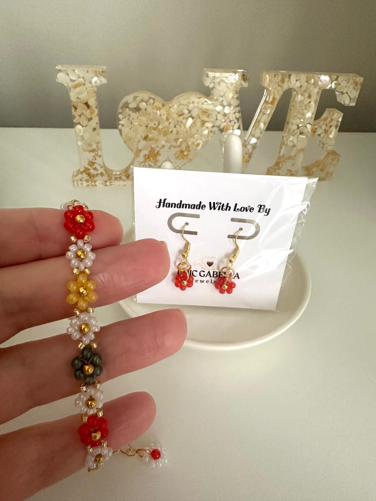 Colorful handmade flower bracelet with gold beads and adjustable chain