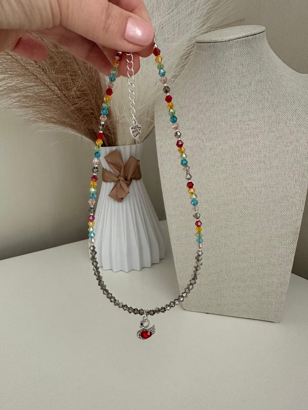 Handmade necklace with silver swan pendant and colorful crystal glass beads
