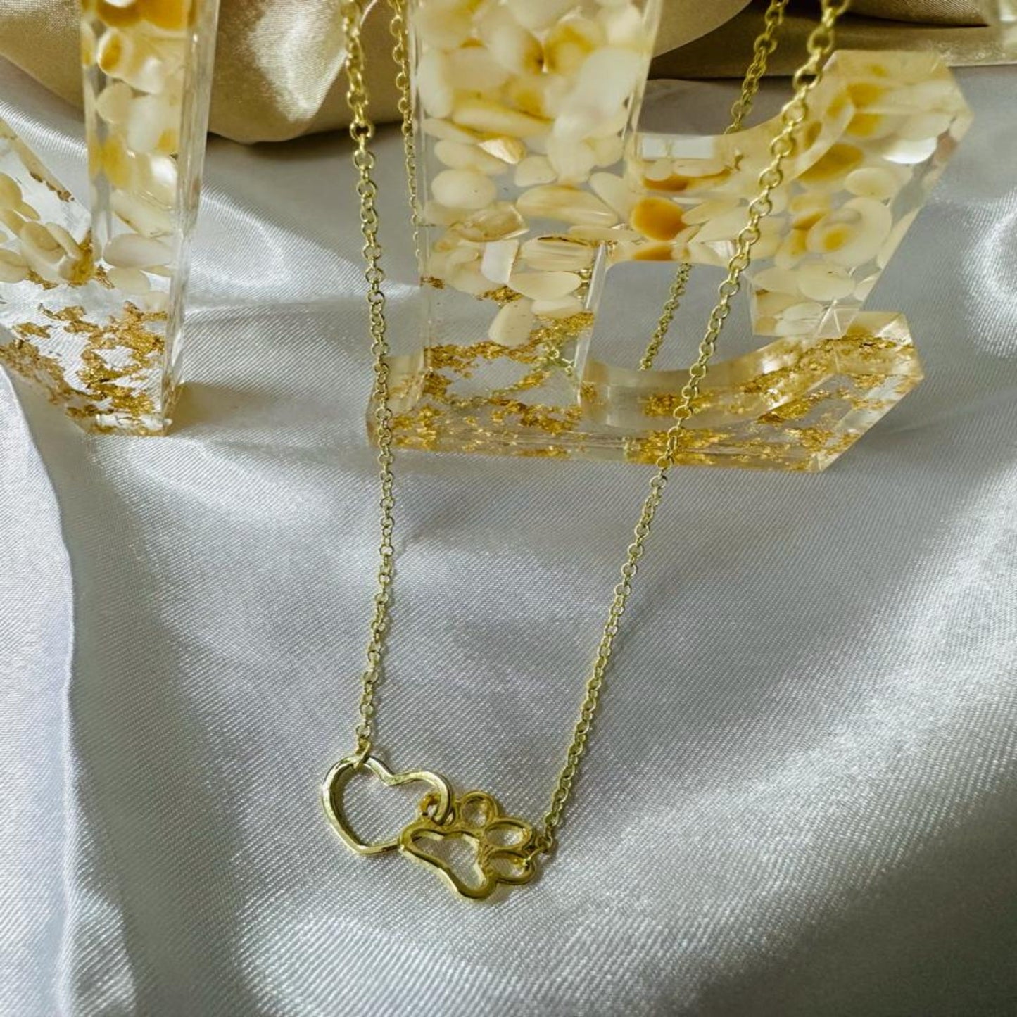 Elegant stainless steel heart and paw necklace in gold and silver