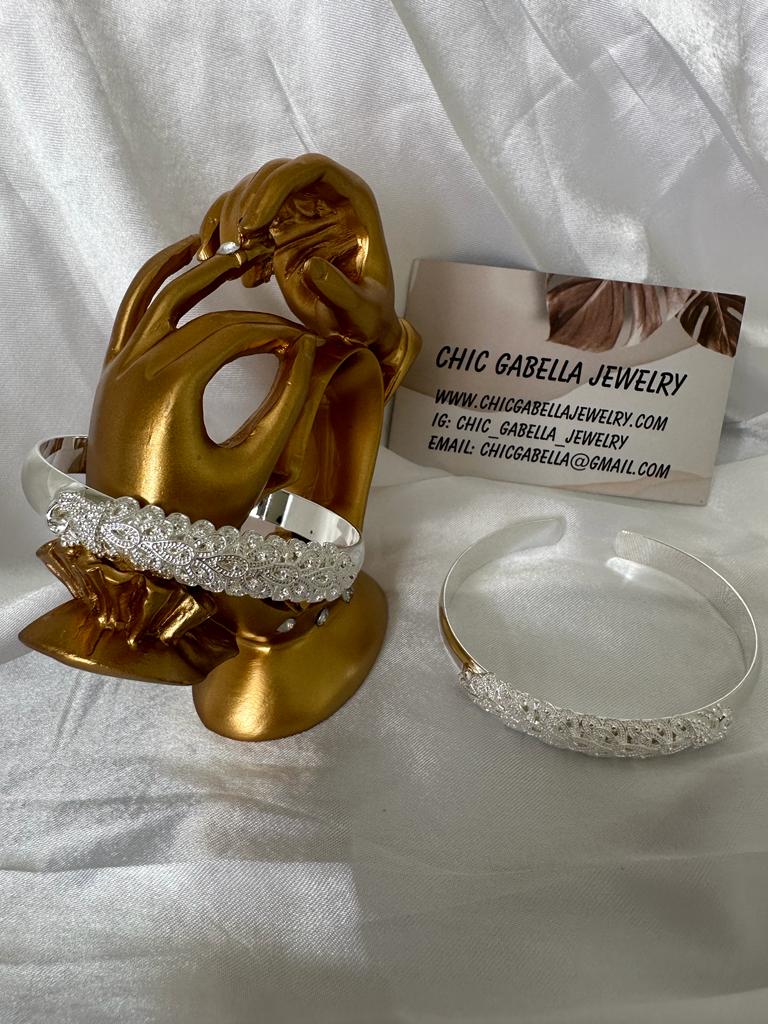 Silver leaf crystal cuff bangle with open design and intricate nature-inspired pattern