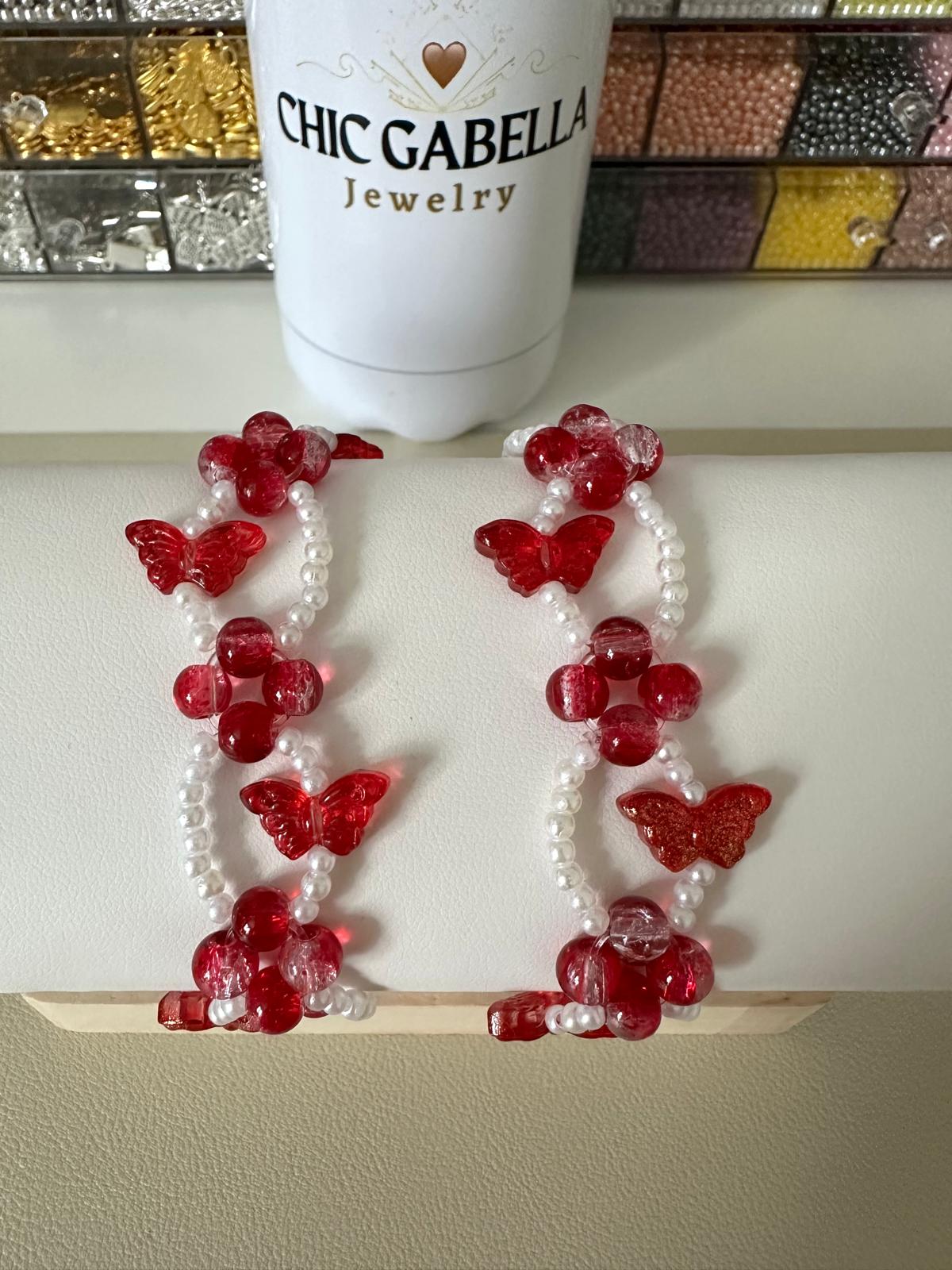Red Butterfly Bliss stretch bracelet with red butterfly bead and white faux pearls