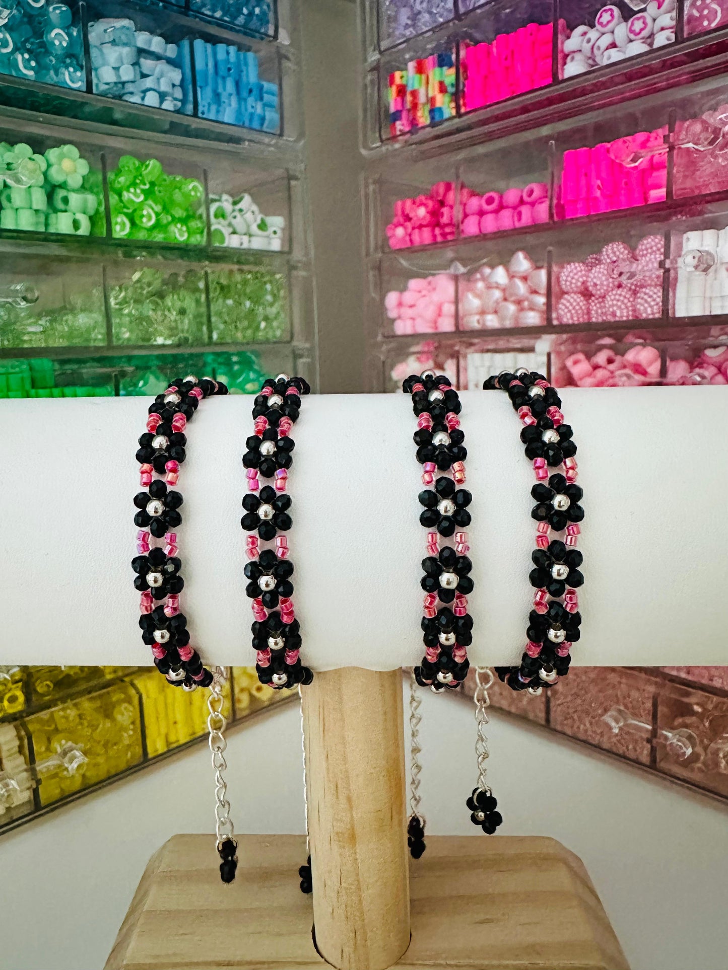 NOIR BLOSSOM handmade bracelet with black glass, silver, and red Miyuki beads on a stainless steel chain