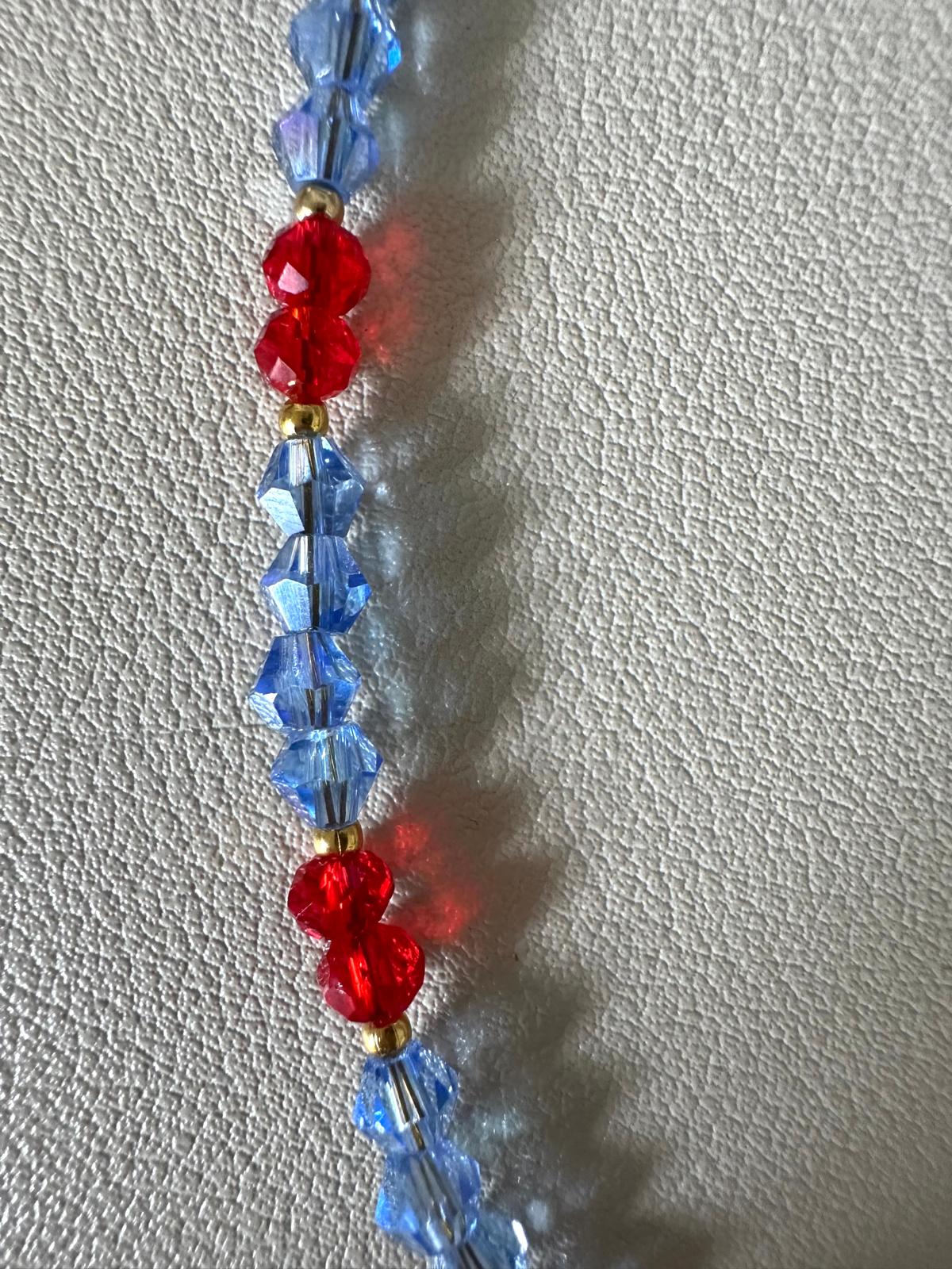 ADDISON handmade necklace with blue flower ceramic bead and gold-plated chain