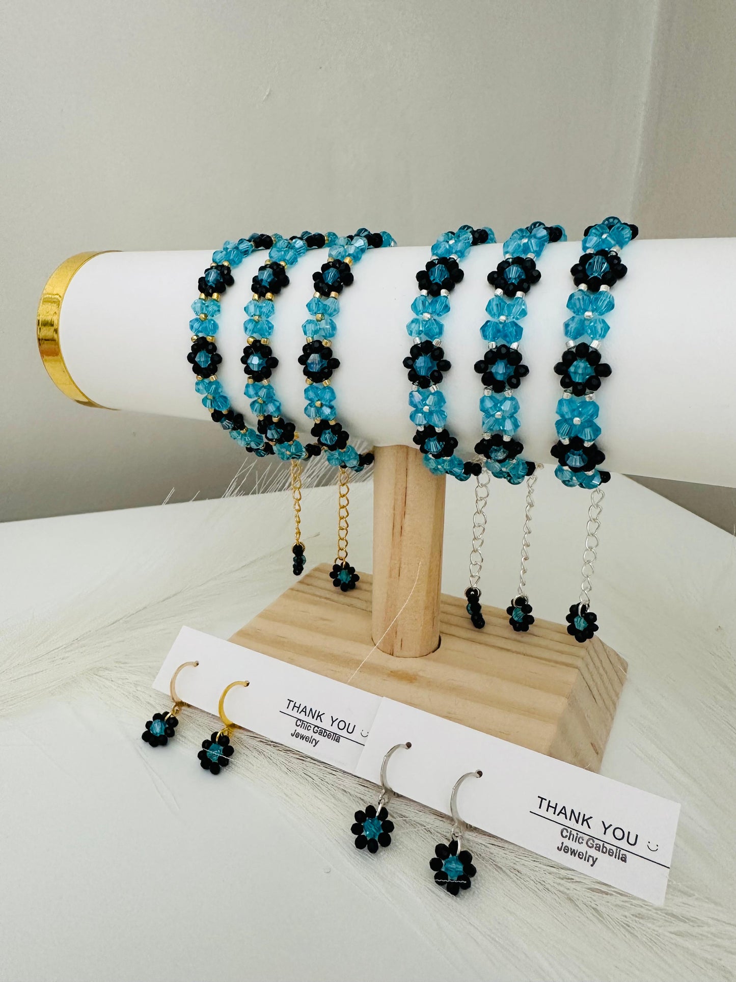 Handmade turquoise and black bead earrings with gold and silver leverback hoops for elegant daily wear