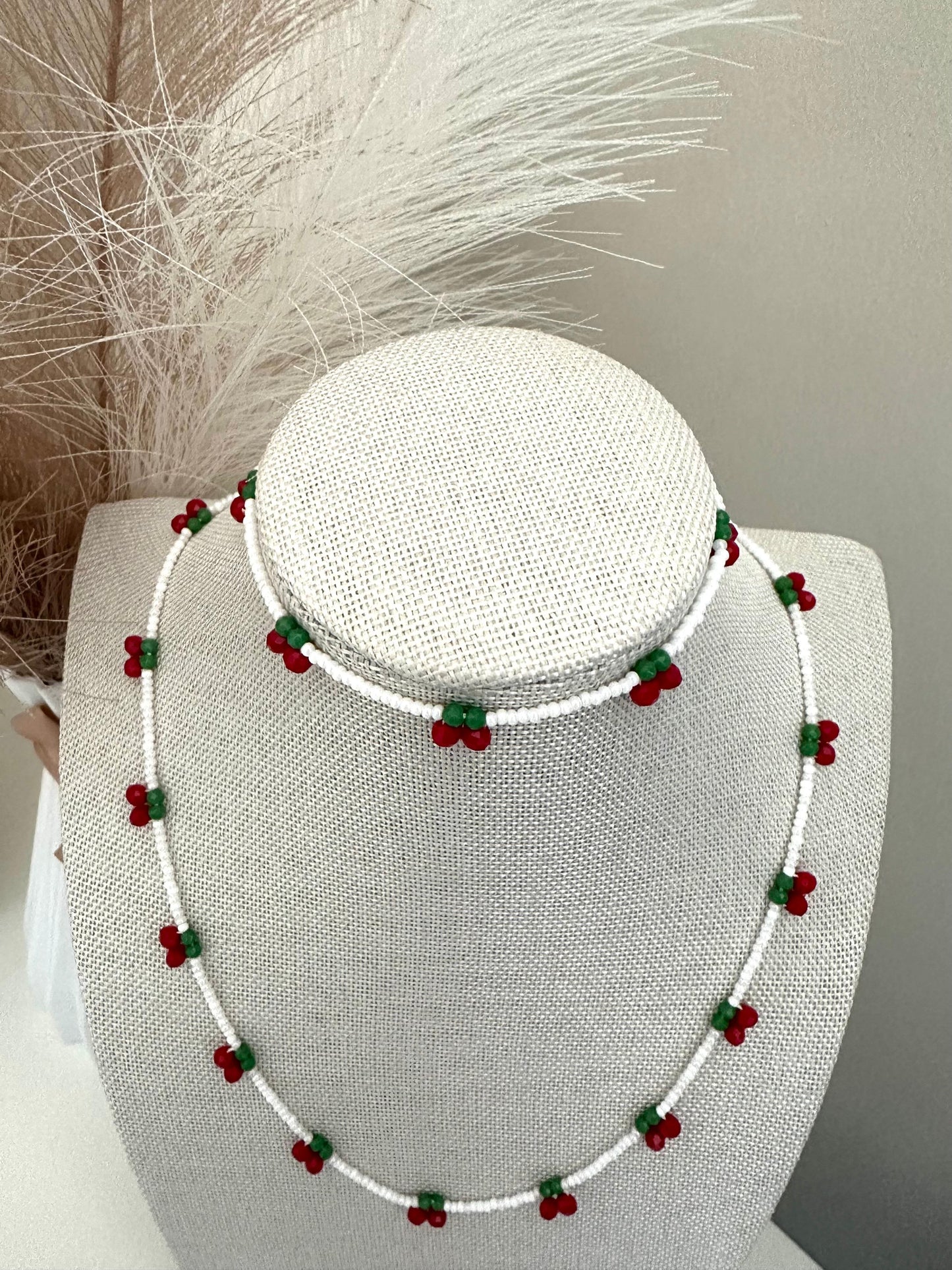Handmade CHERRY DELIGHT bracelet with white, red, and green glass beads and stainless steel clasp