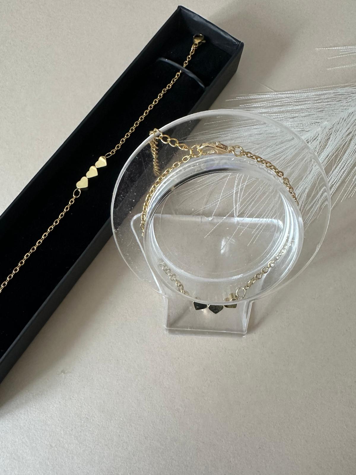 Triple heart stainless steel bracelet with 18K gold plating and minimalist design