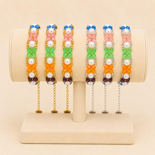 Handmade HARMONY OF HUES bracelet with colorful crystal beads, white faux pearls, and gold or silver stainless steel chain