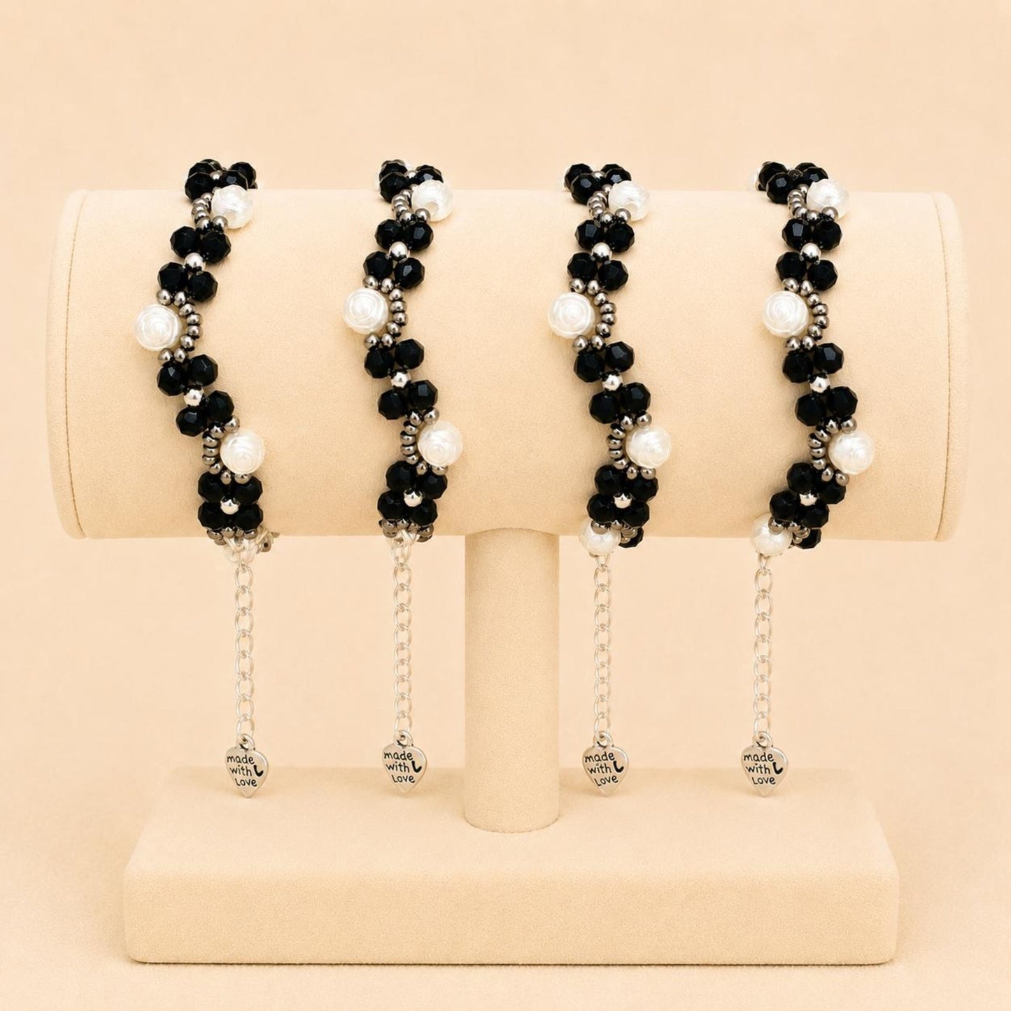 Handmade MIDNIGHT ROSES bracelet with black crystal, silver, gray, and white rose-shaped faux pearl beads on a stainless steel chain
