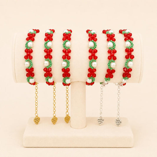Elegant festive bracelet with red, white, and green beads in gold and silver options, handmade accessory