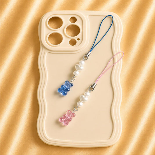 Handmade BEAR HEART DREAM phone charm with customizable blue or pink bear design, versatile accessory for phones, AirPods, keys, and bags.