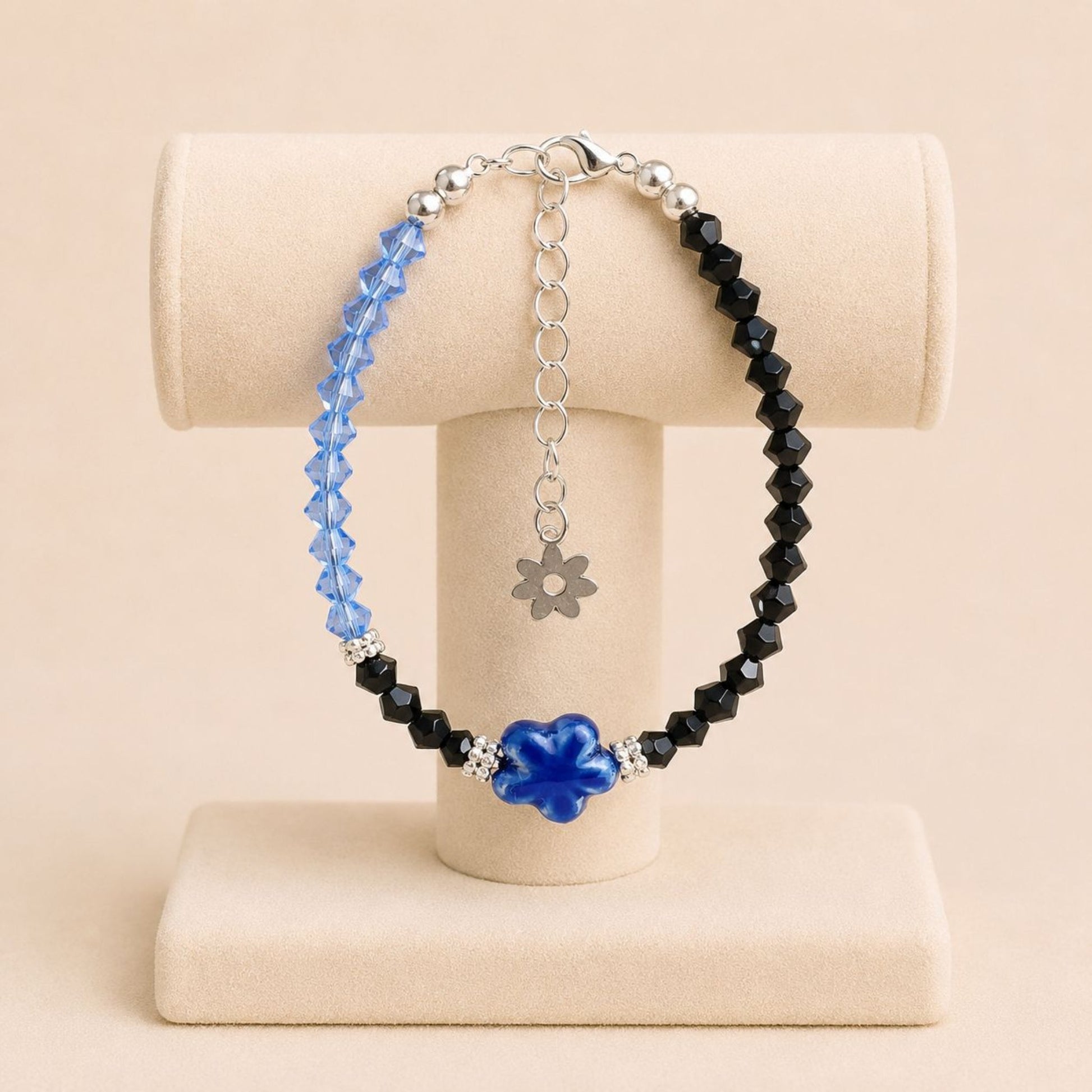 Handmade AUBREE bracelet with blue and black crystal beads and silver rhinestone spacers