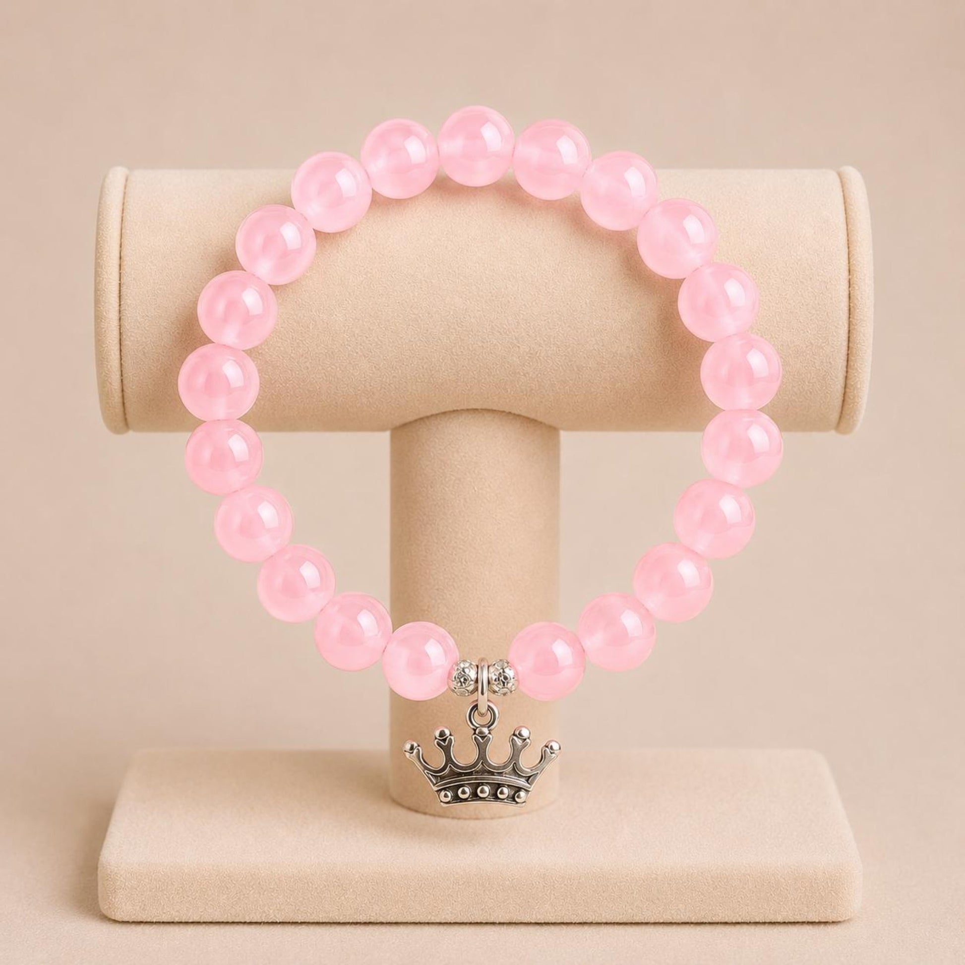 CROWN Stretch Bracelet with pink glass beads and silver crown charm on elastic band