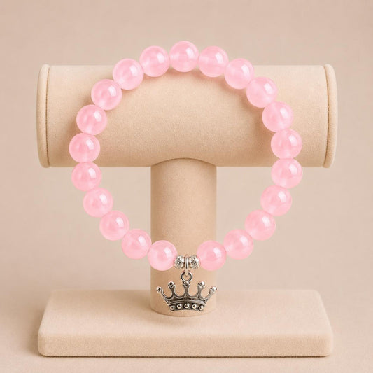 CROWN Stretch Bracelet with pink glass beads and silver crown charm on elastic band