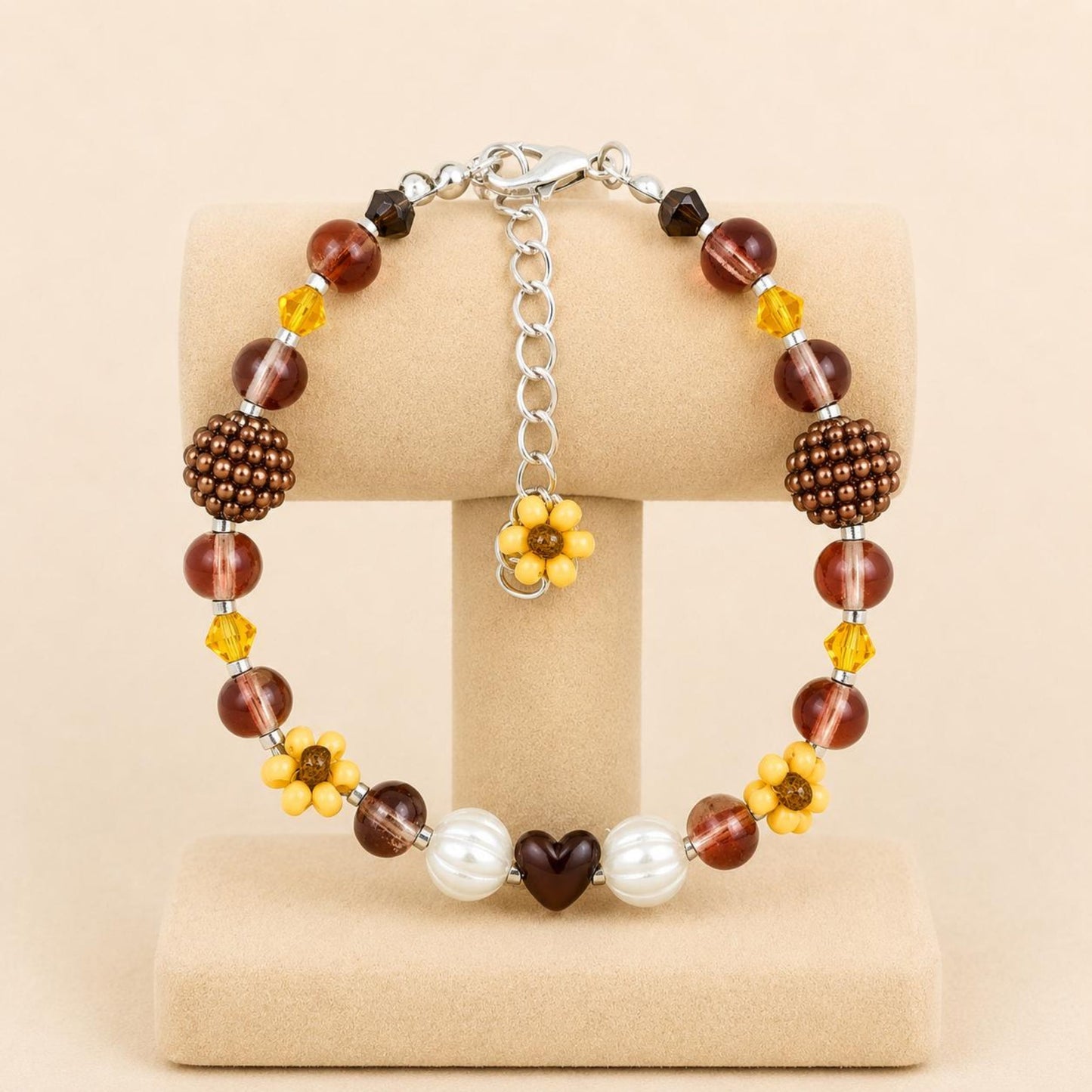 Handmade bracelet with earthy tones glass beads, faux pearls, and seed beads on stainless steel chain