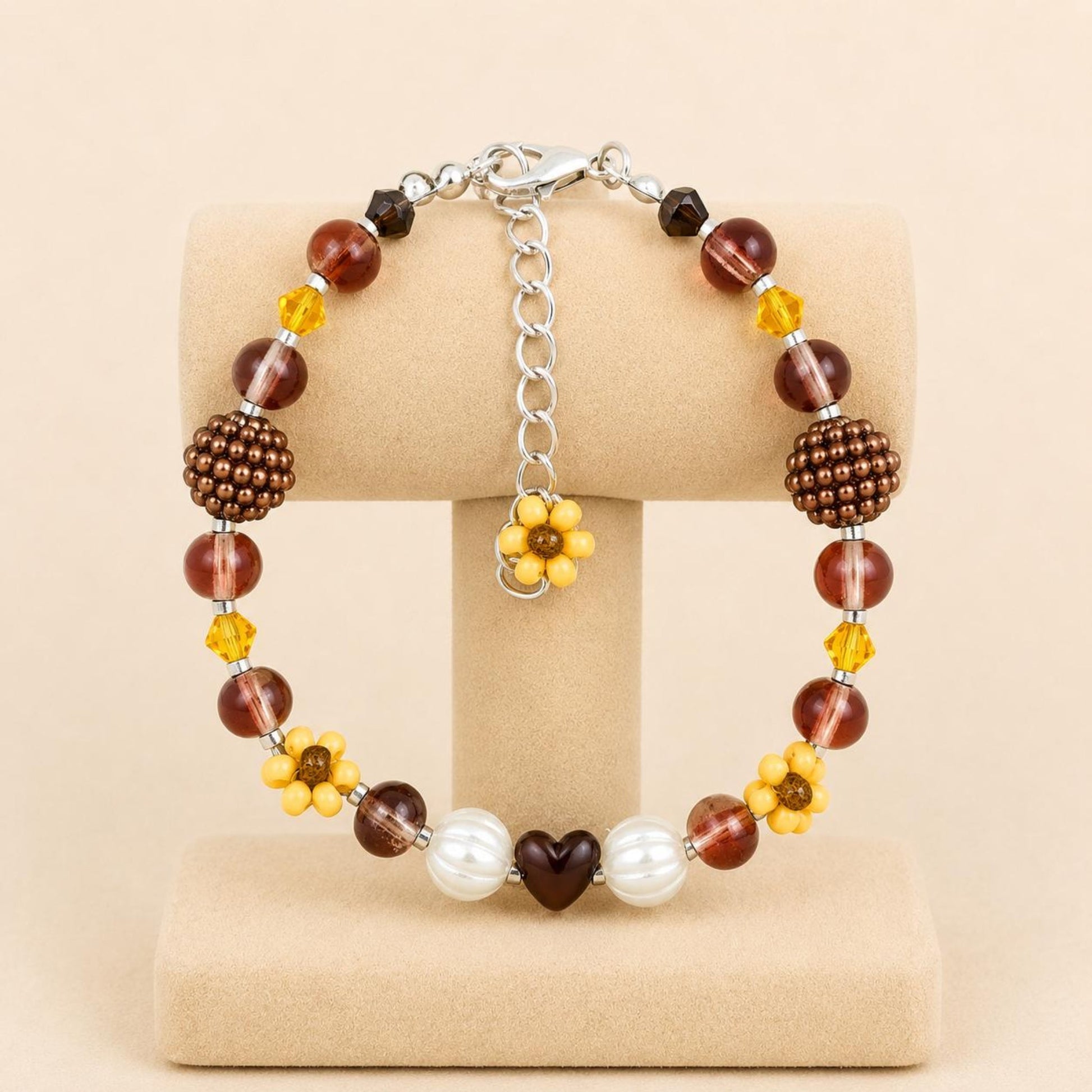 Handmade bracelet with earthy tones glass beads, faux pearls, and seed beads on stainless steel chain