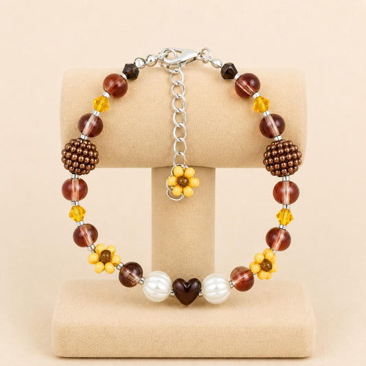 Handmade bracelet with earthy tones glass beads, faux pearls, and seed beads on stainless steel chain