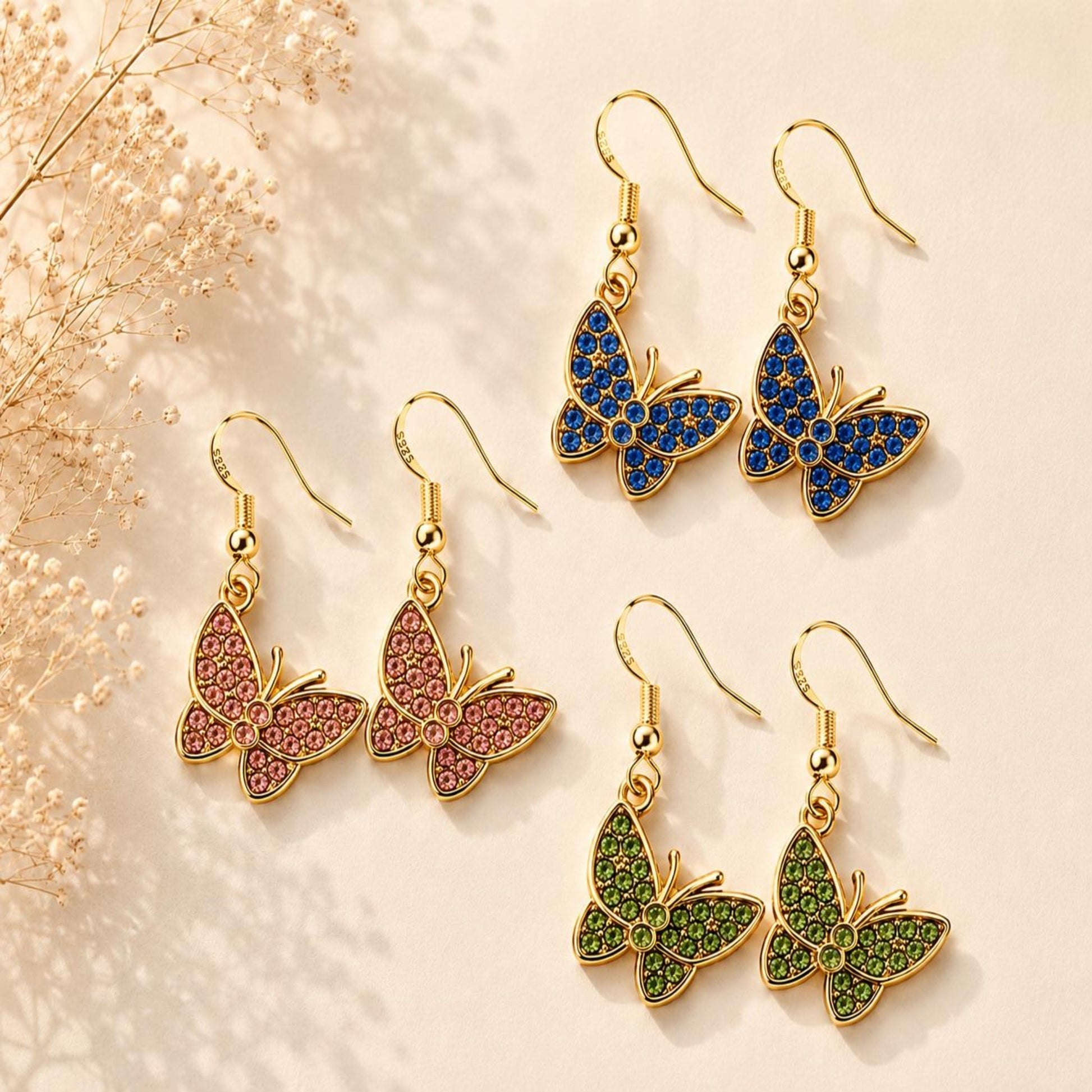 Handmade golden butterfly earrings with sparkling crystals and stainless steel hooks