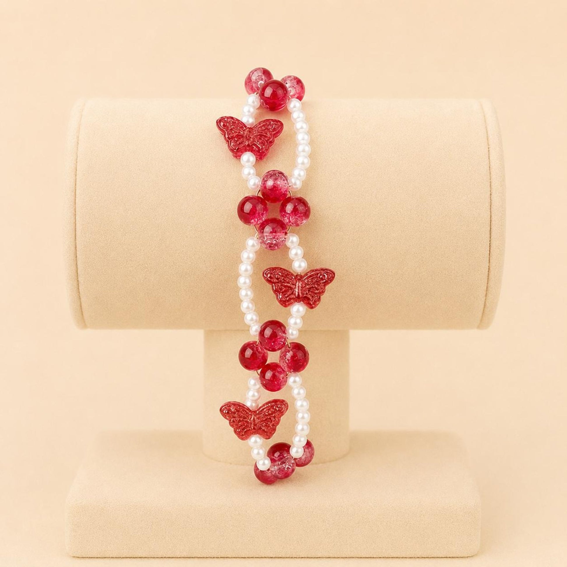 Red butterfly bliss stretch bracelet with white faux pearls and red glass beads on elastic band