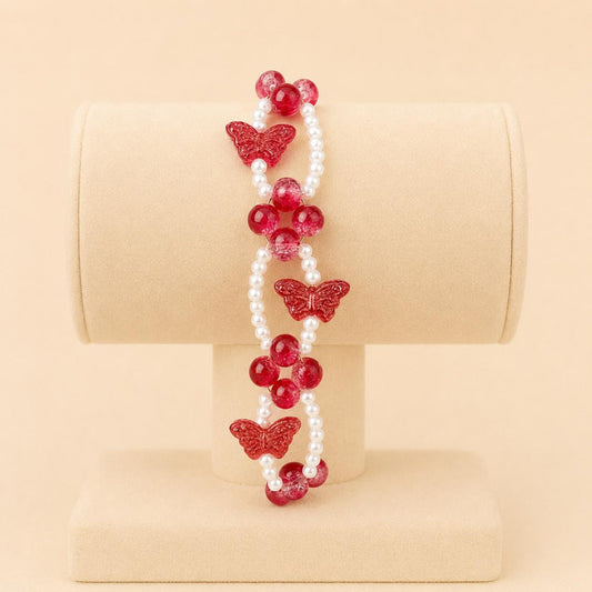 Red butterfly bliss stretch bracelet with white faux pearls and red glass beads on elastic band