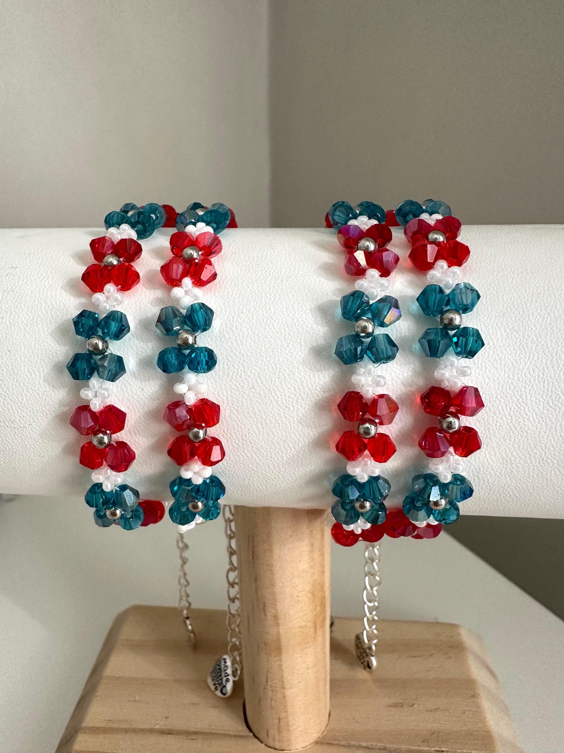 Handmade ALPINE CORAL bracelet with red, turquoise, white, and silver beads on nylon string with stainless steel clasp