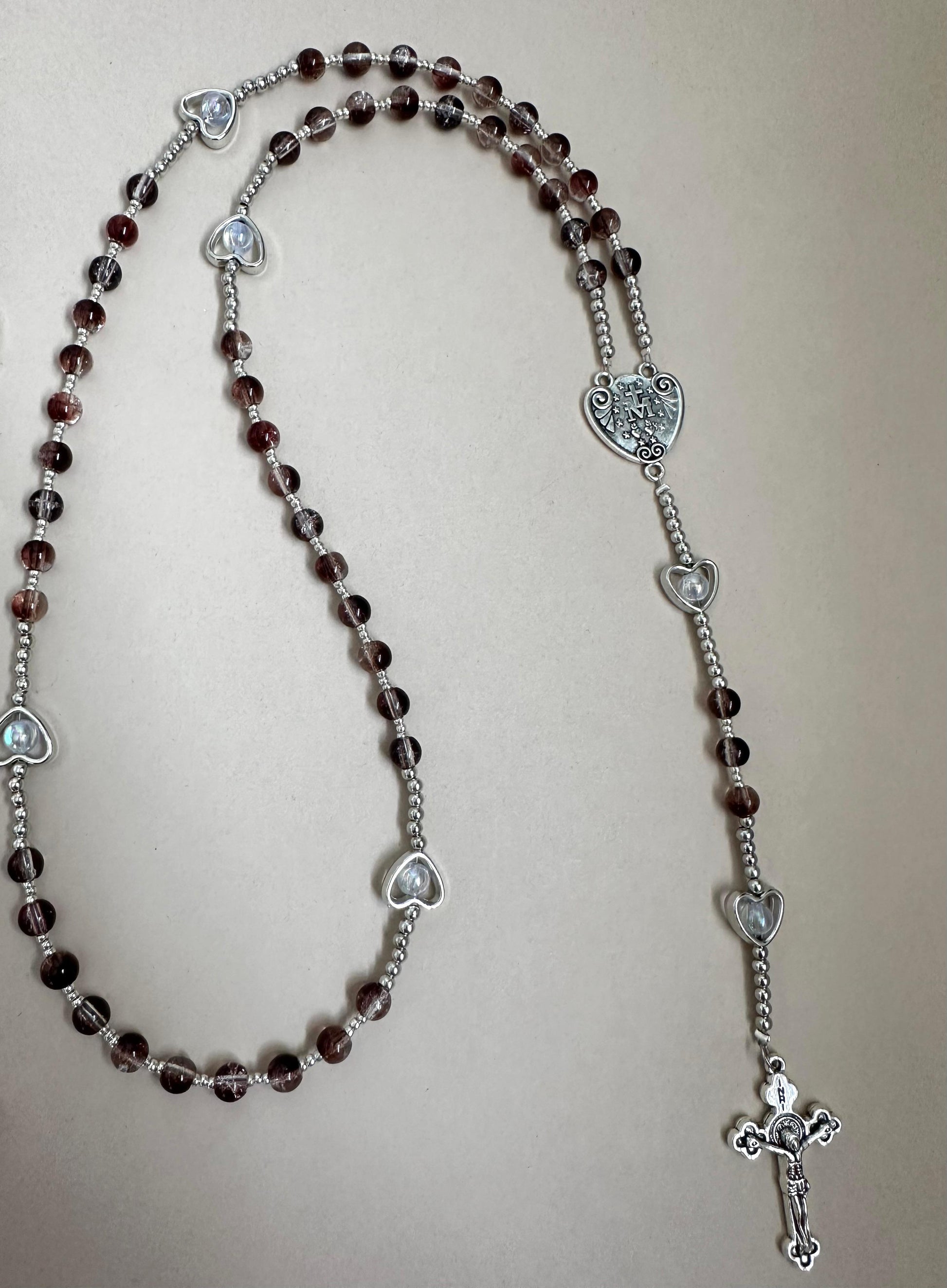 Sacred Grace Handmade Rosary with red glass beads and silver-tone heart-shaped accents