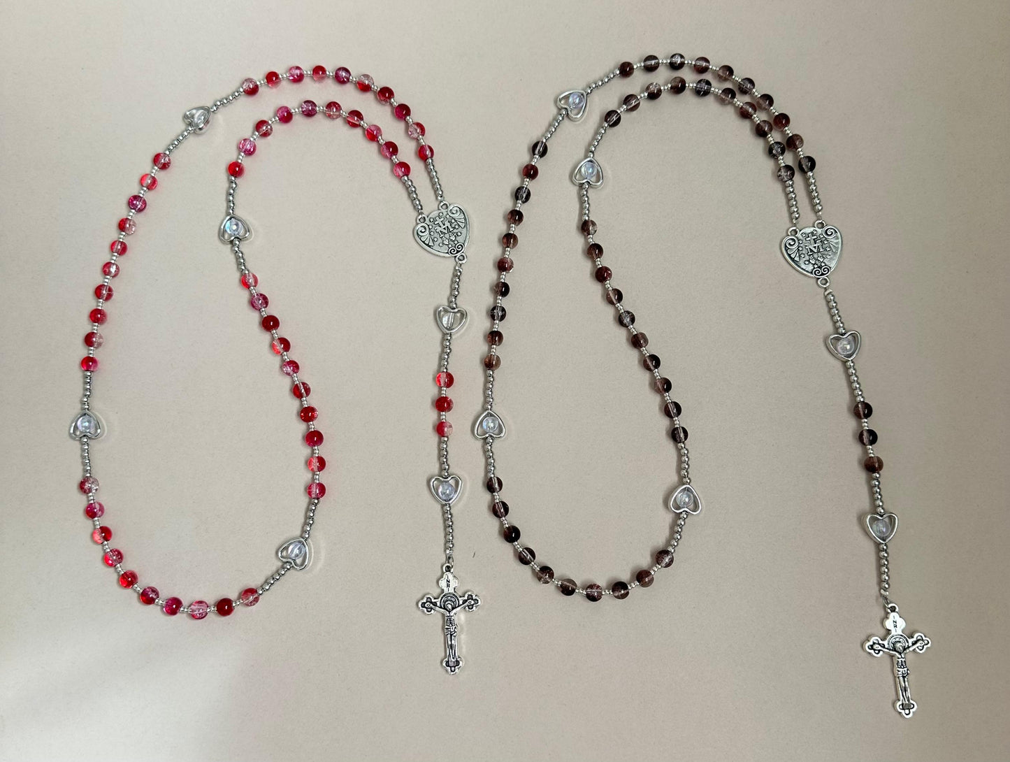 Sacred Grace Handmade Rosary with red glass beads and silver-tone heart-shaped accents