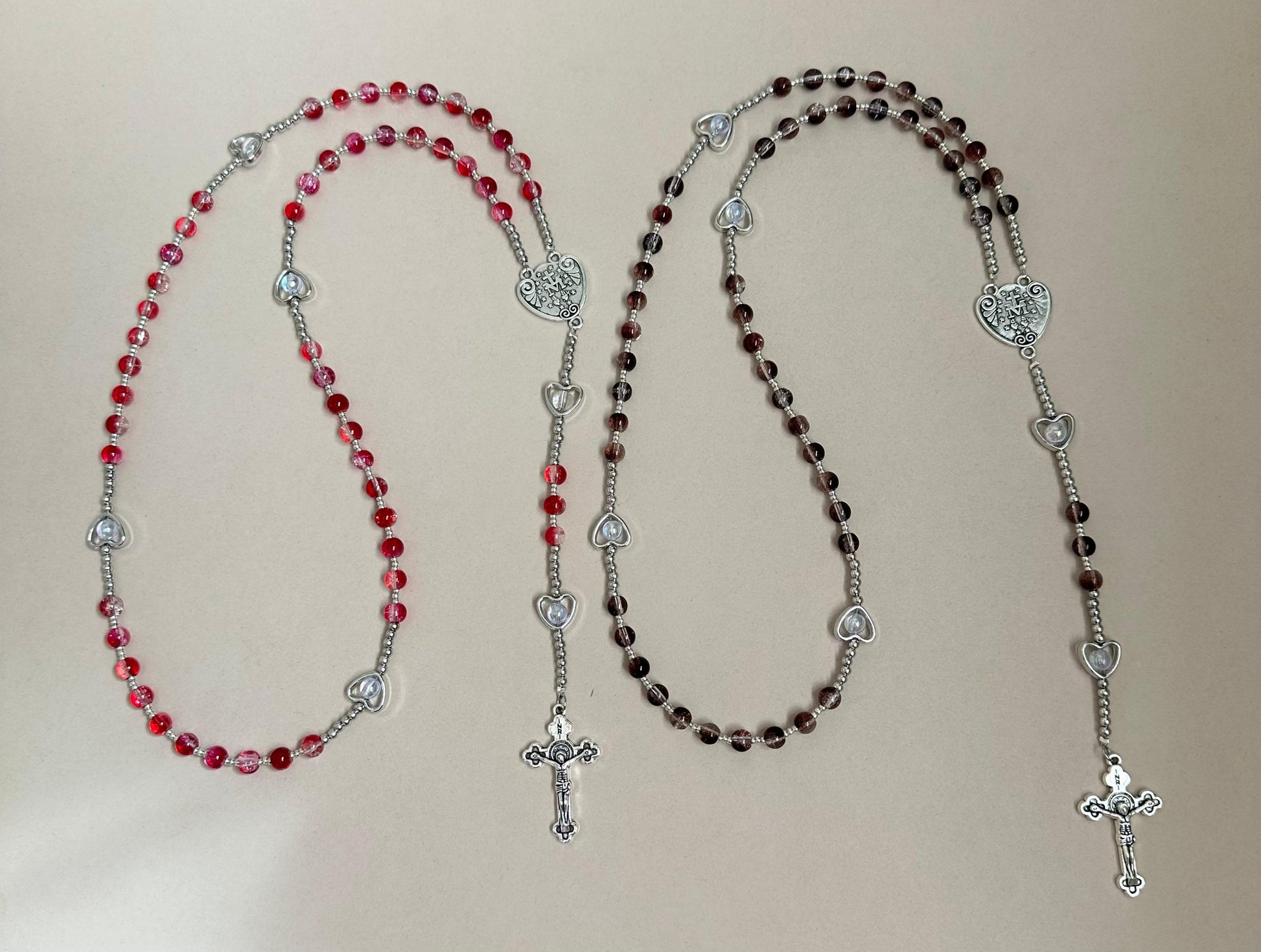 Sacred Grace Handmade Rosary with red glass beads and silver-tone heart-shaped accents