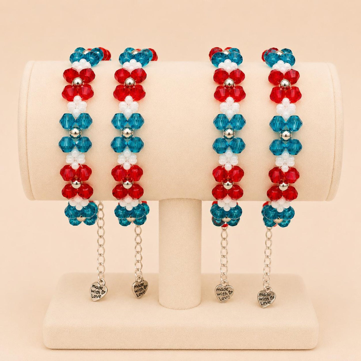 ALPINE CORAL handmade bracelet with red, turquoise, white, and silver beads on stainless steel chain