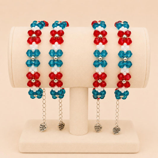 ALPINE CORAL handmade bracelet with red, turquoise, white, and silver beads on stainless steel chain
