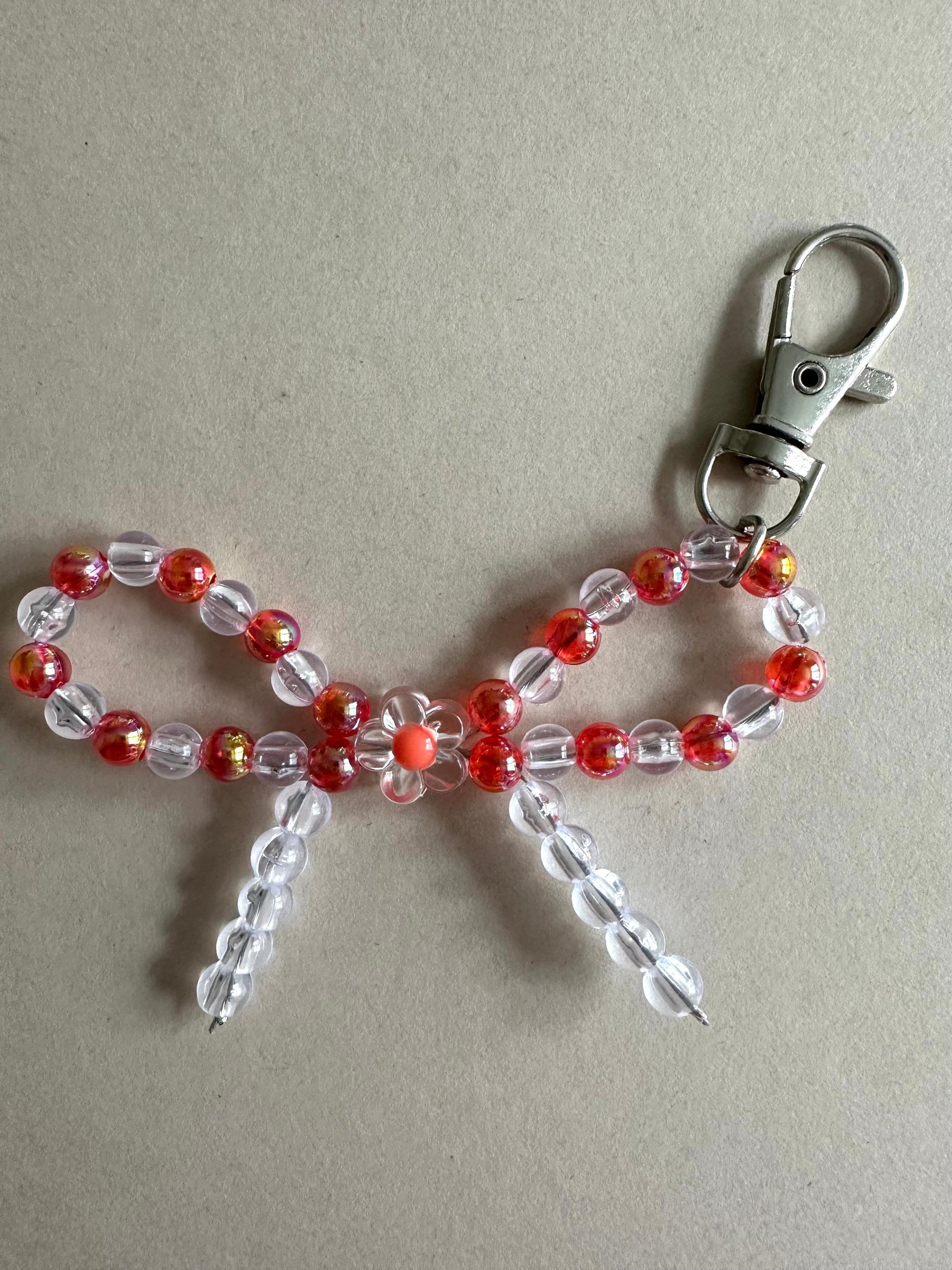 Handmade Transparent Reddish - Orange BOW Silver Keychain