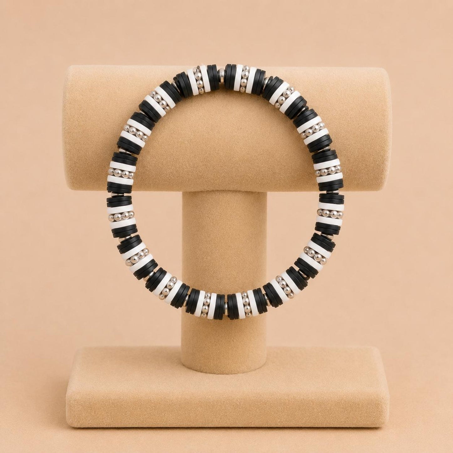 ARCTIC NIGHT stretch bracelet with black and white polymer clay beads and silver accents on elastic band