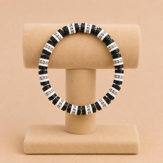 ARCTIC NIGHT stretch bracelet with black and white polymer clay beads and silver accents on elastic band