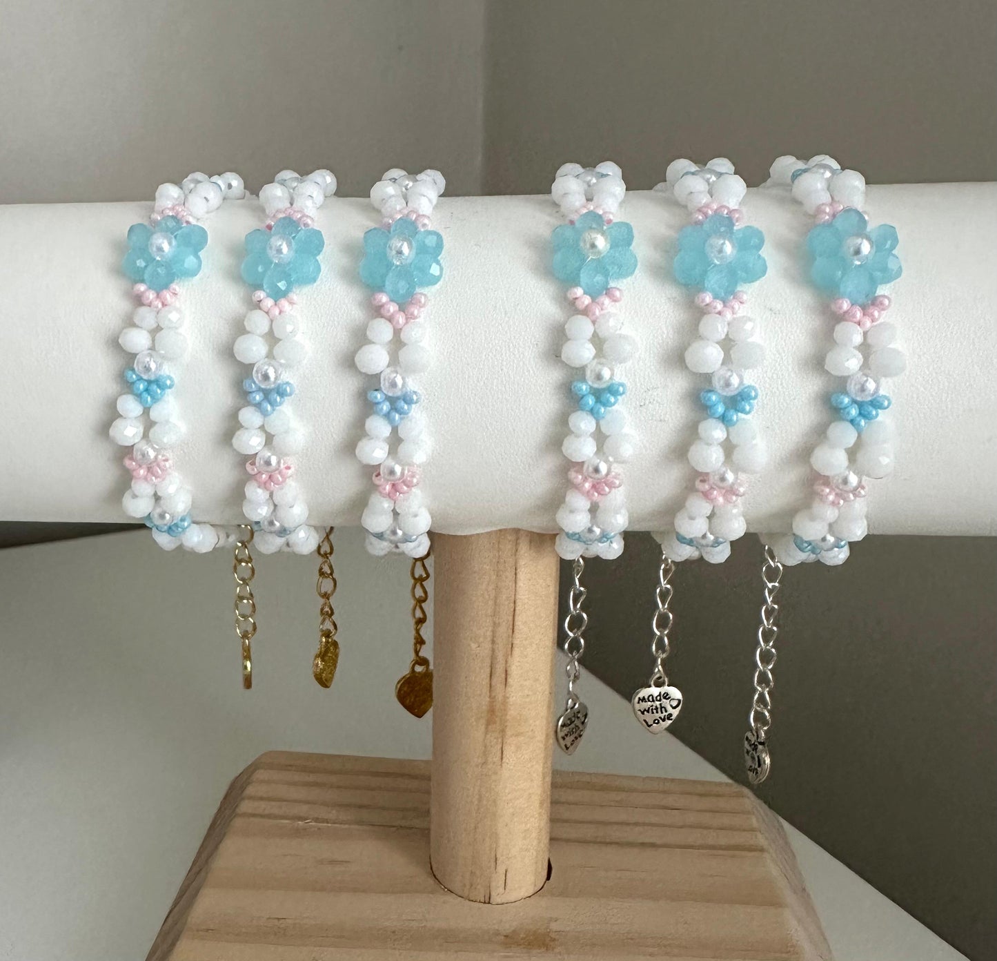 Handmade pastel bloom bracelet with white and blue beads, silver and gold options