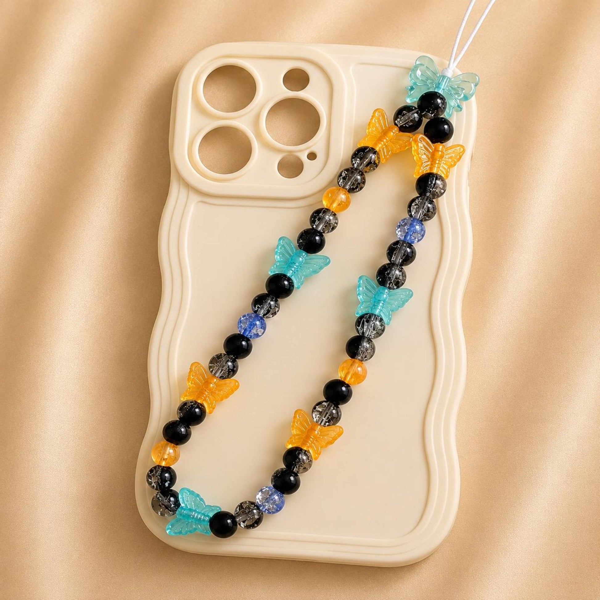 Midnight Butterfly handmade phone charm with glass beads and butterfly design