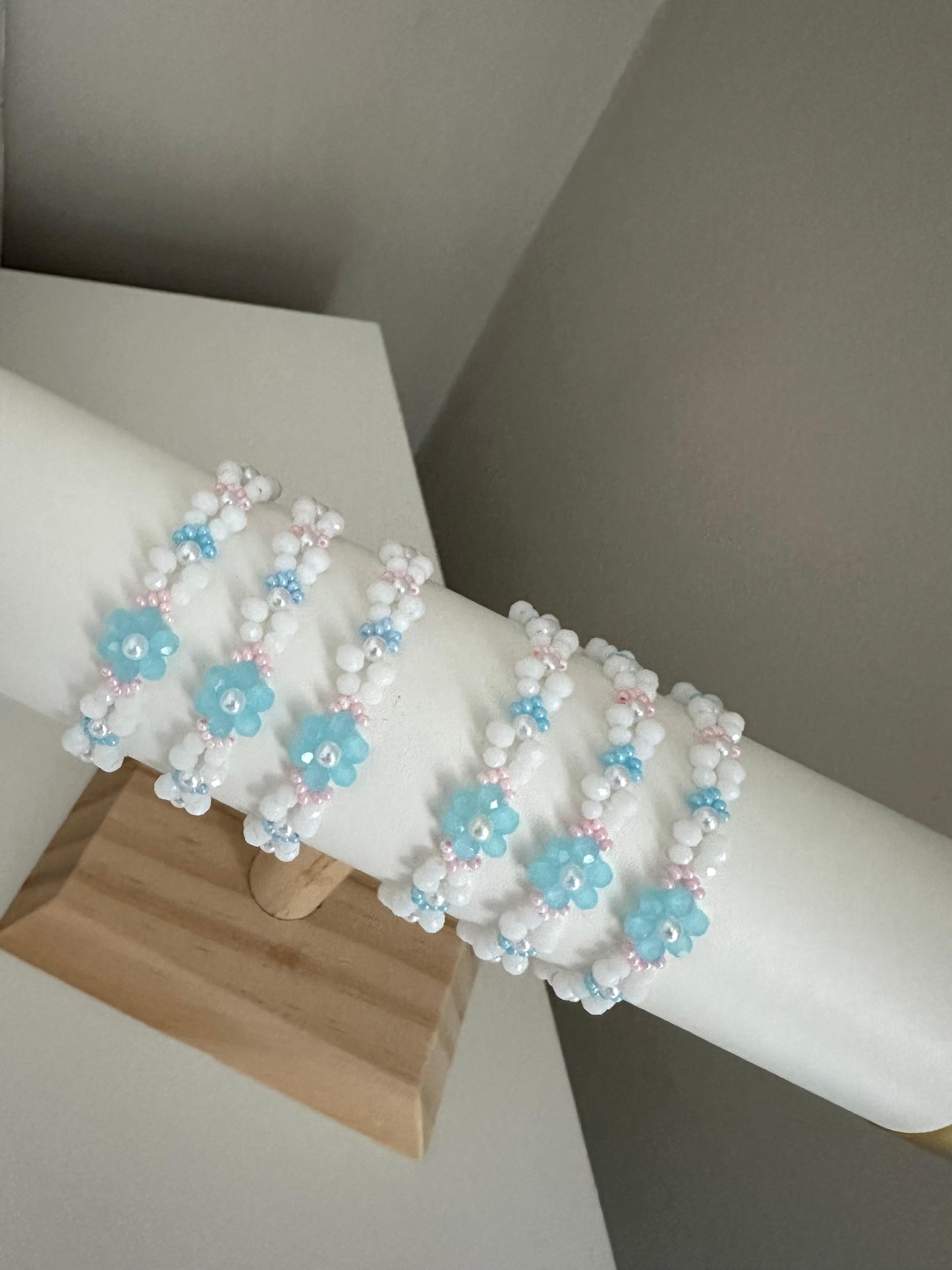 Handmade Pastel Bloom bracelet with gold and silver options featuring white, blue glass beads and faux pearls
