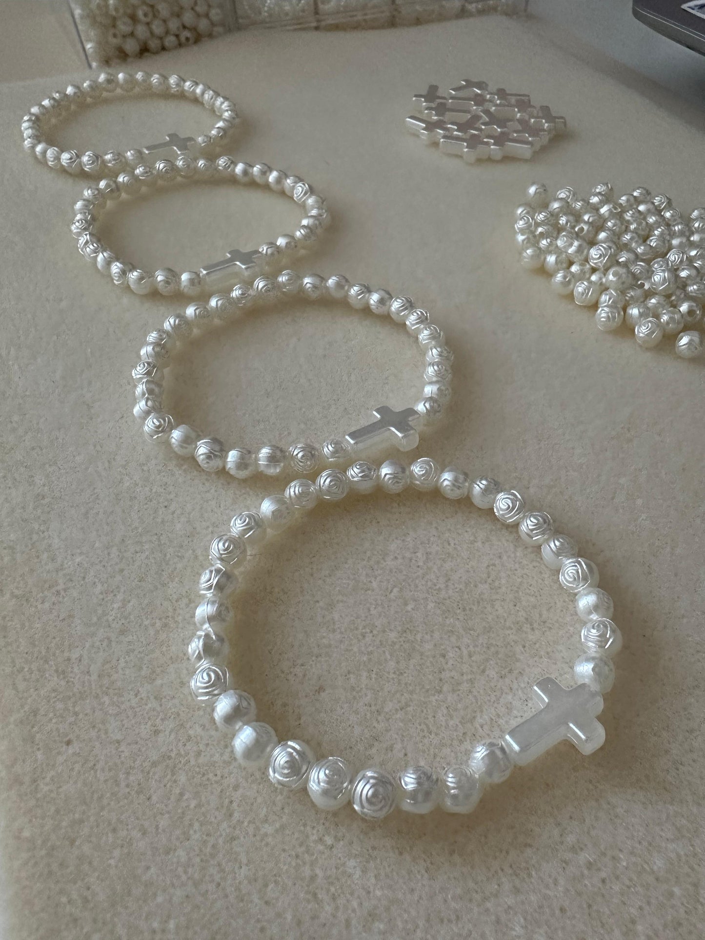 White rose cross stretch bracelet with faux pearl beads and elastic band
