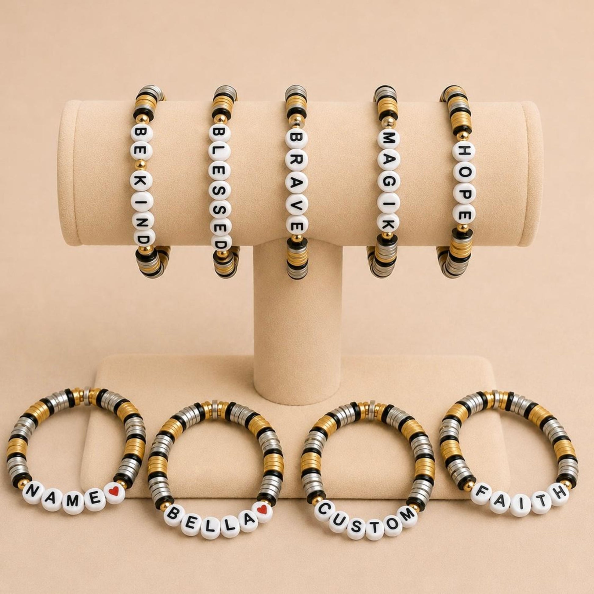 Personalized stretch bracelet with gold, silver, and black beads and customizable letter charms