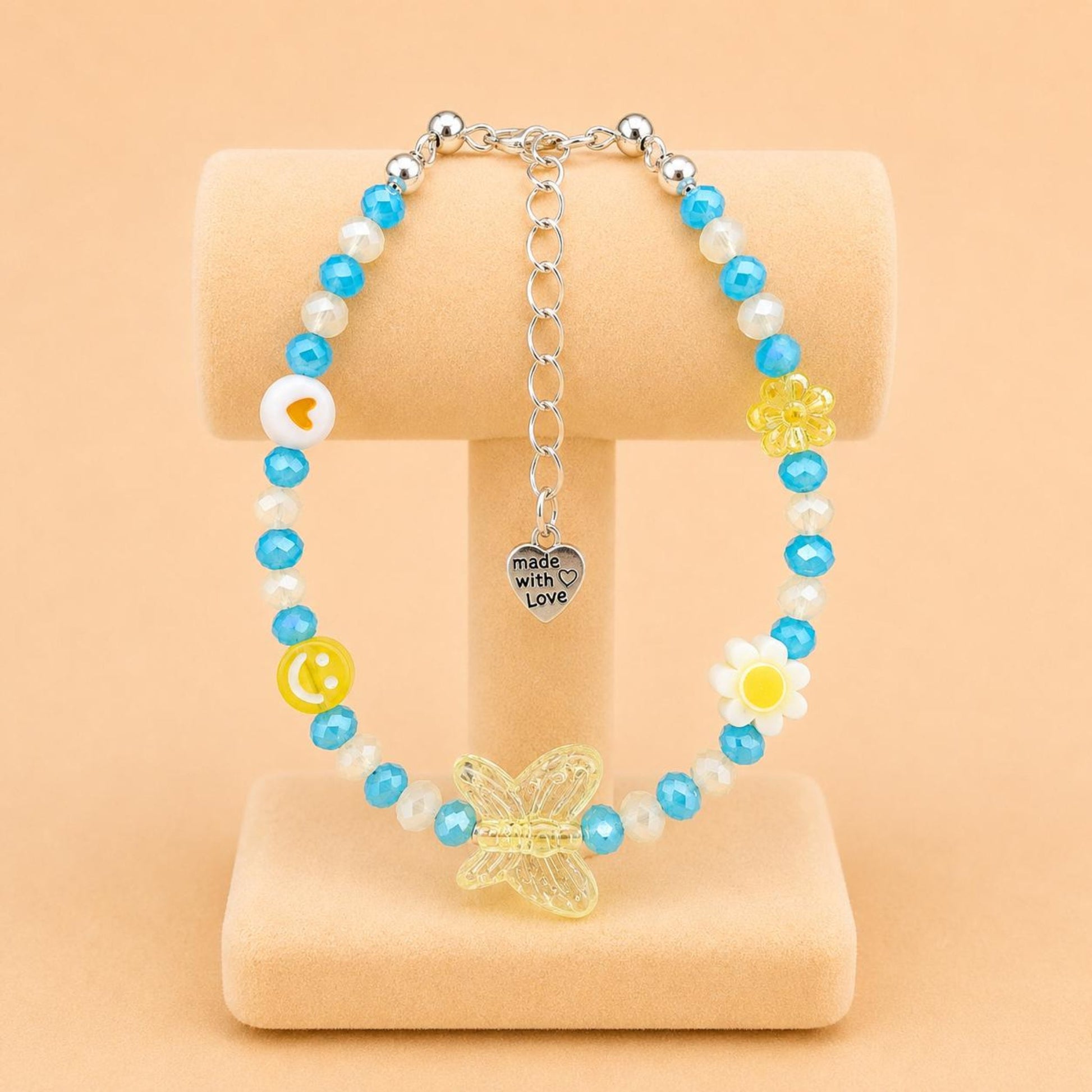 Colorful SUNNY DREAM handmade bracelet with blue, yellow, and white glass and acrylic beads on a stainless steel chain