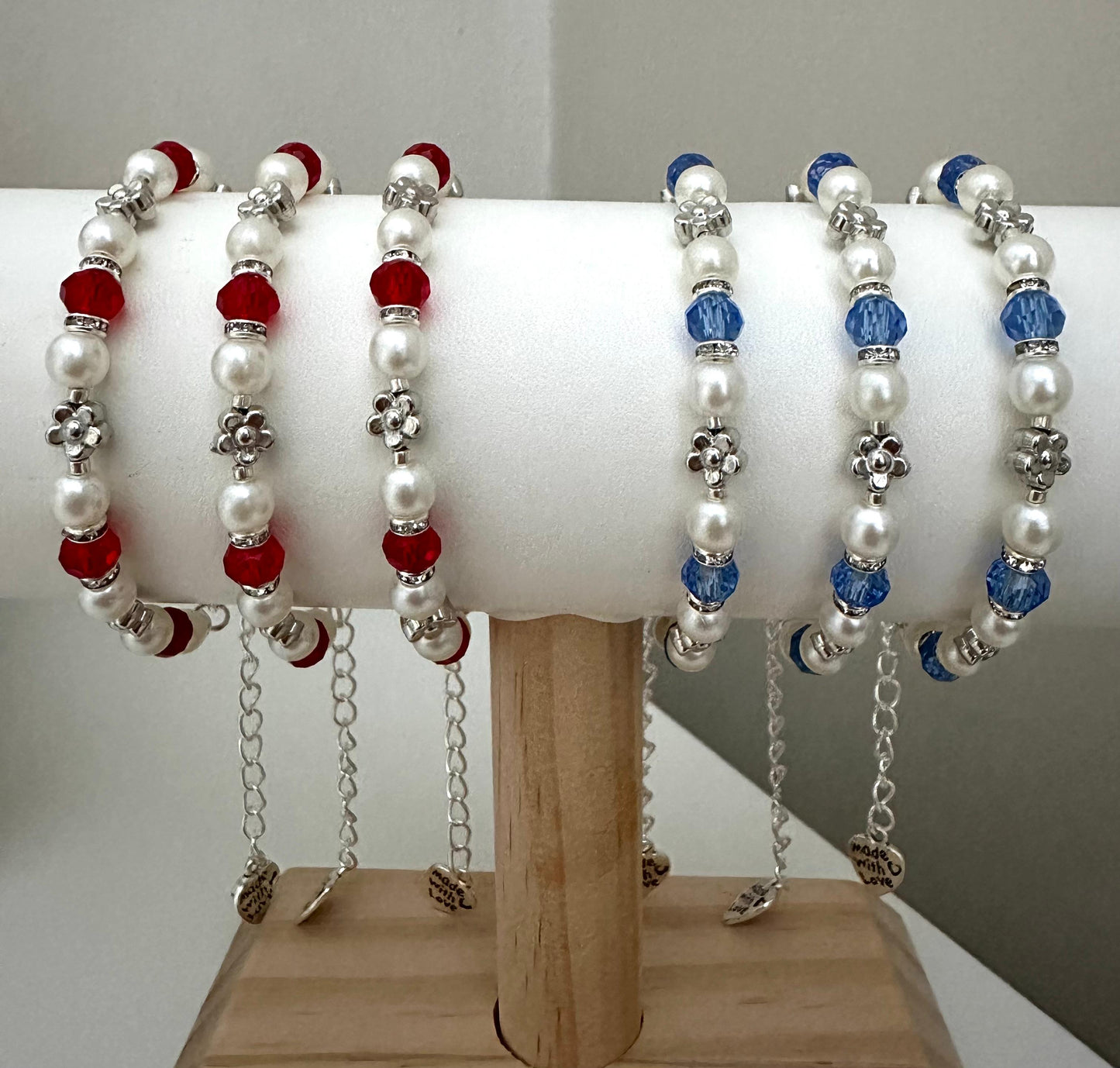 Handmade pearl and crystal glow bracelet in red or blue with silver floral beads and adjustable chain