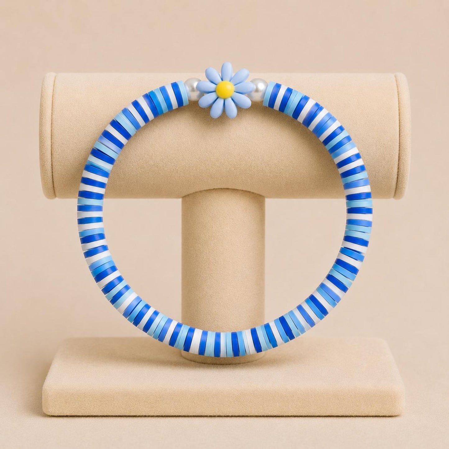 AQUA BLOSSOM stretch bracelet with blue and white polymer clay beads, faux pearls, and flower-shaped bead on elastic band