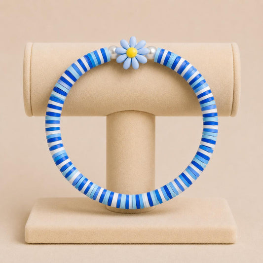 AQUA BLOSSOM stretch bracelet with blue and white polymer clay beads, faux pearls, and flower-shaped bead on elastic band