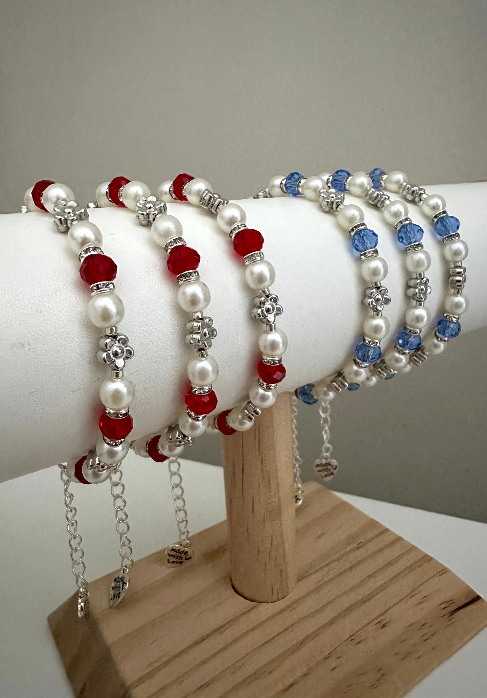 Handmade pearl and crystal glow bracelet in red and blue with silver flower beads and adjustable chain